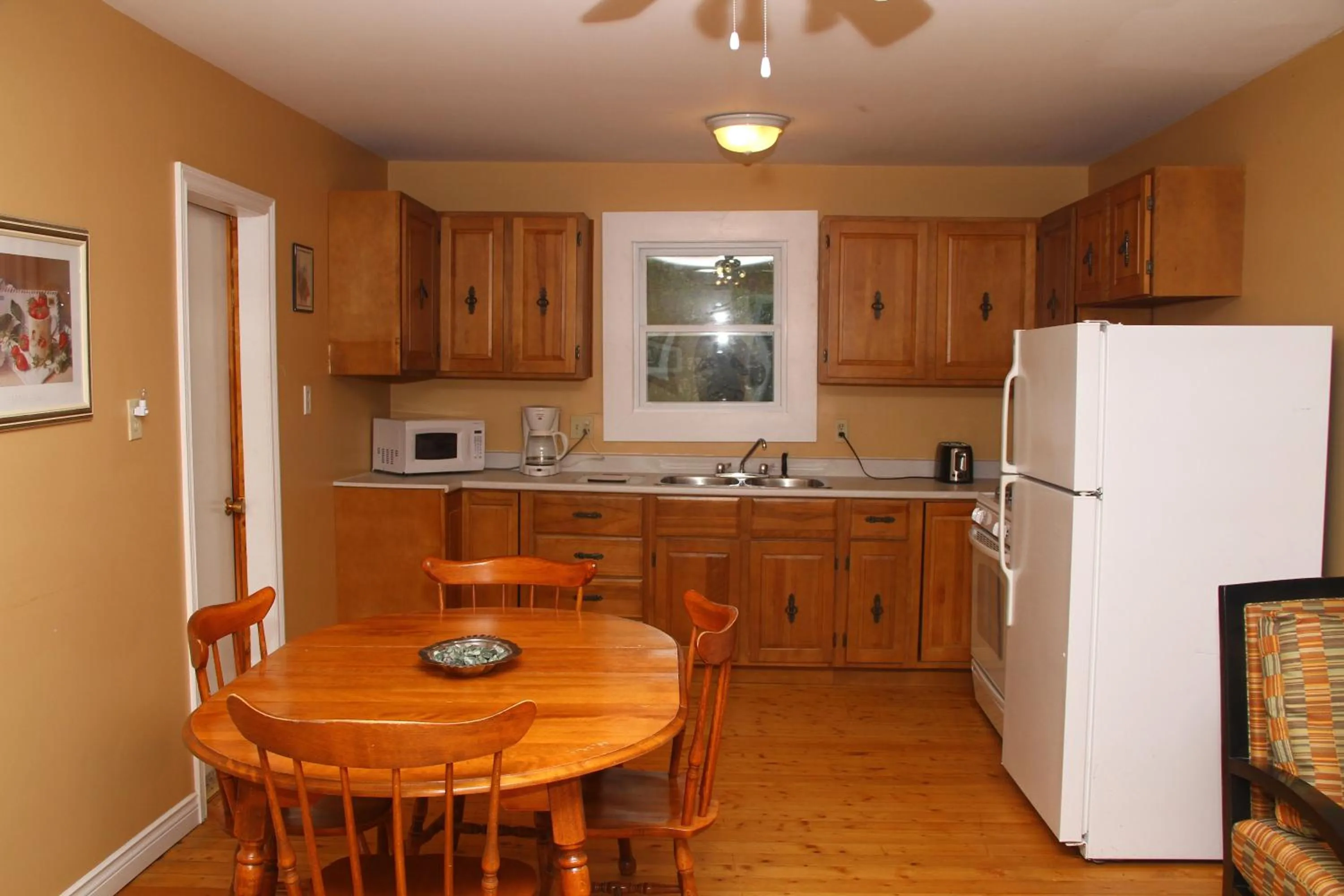 Kitchen or kitchenette in By the Bay Cottages