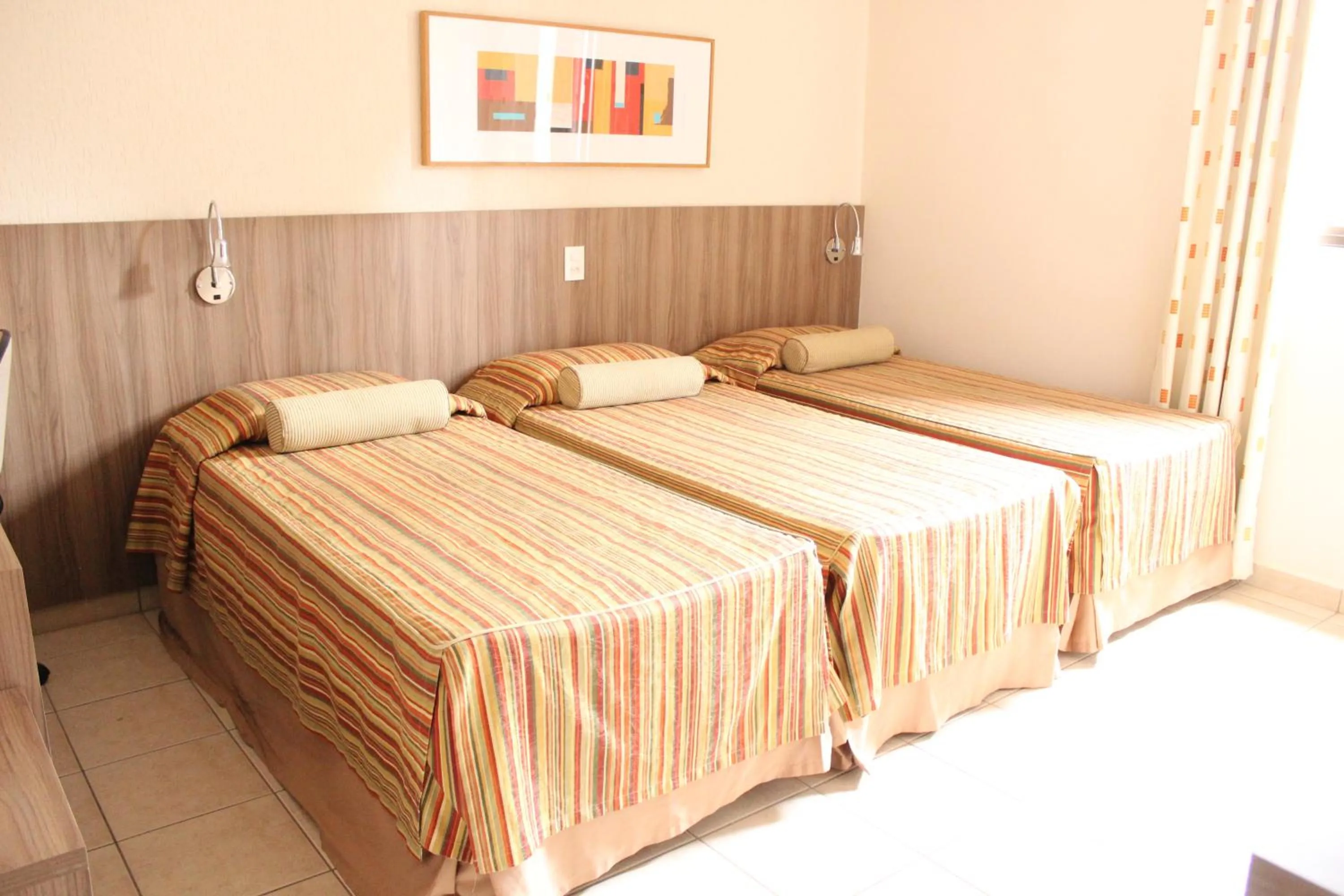 Bed in Hotel Riviera