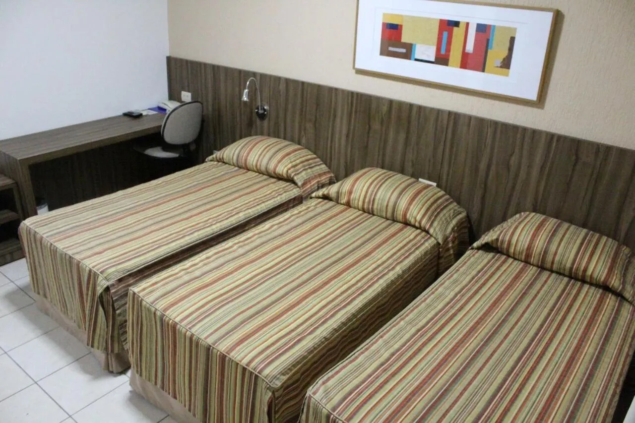 Bed in Hotel Riviera