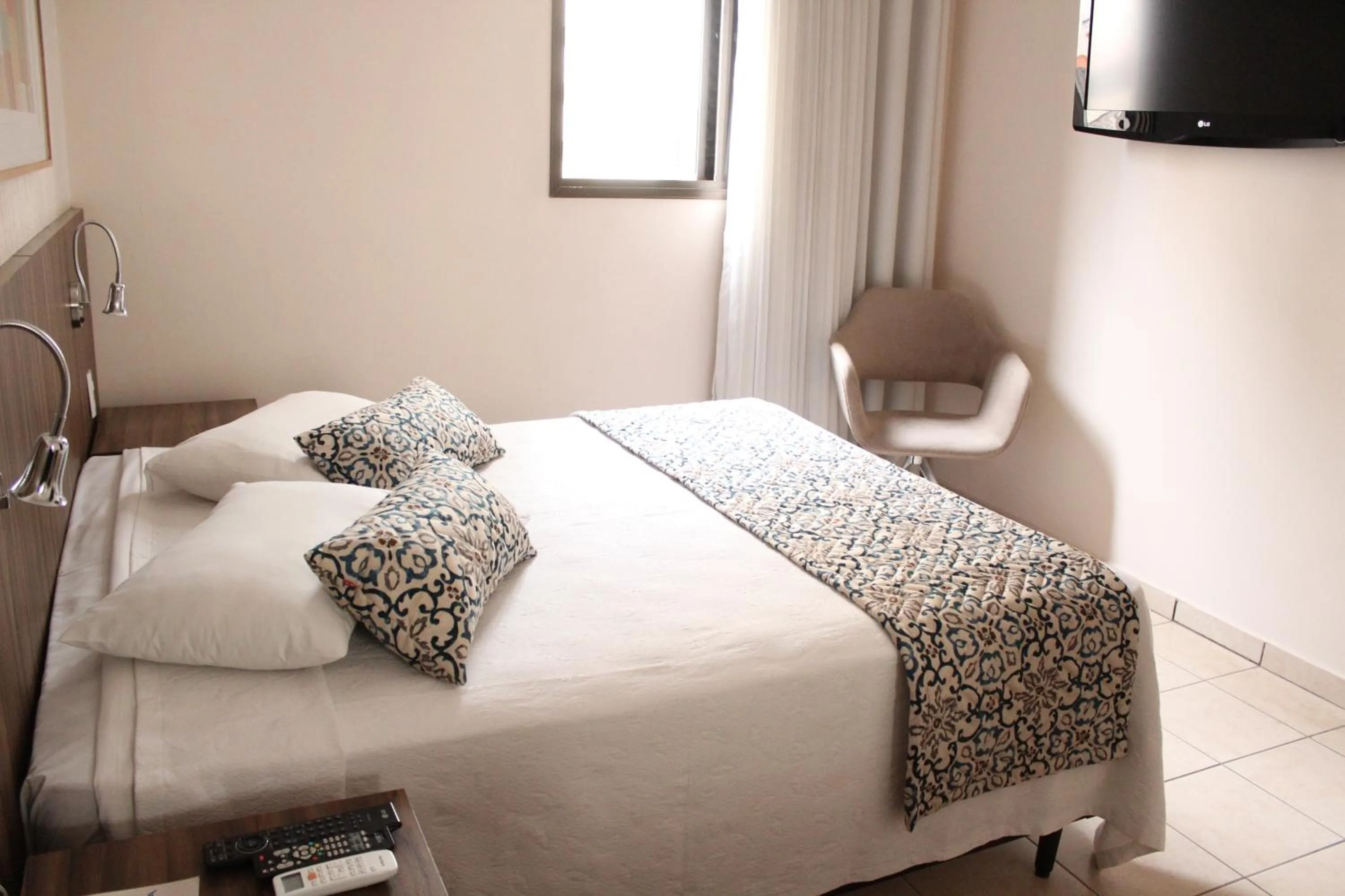 Bed in Hotel Riviera