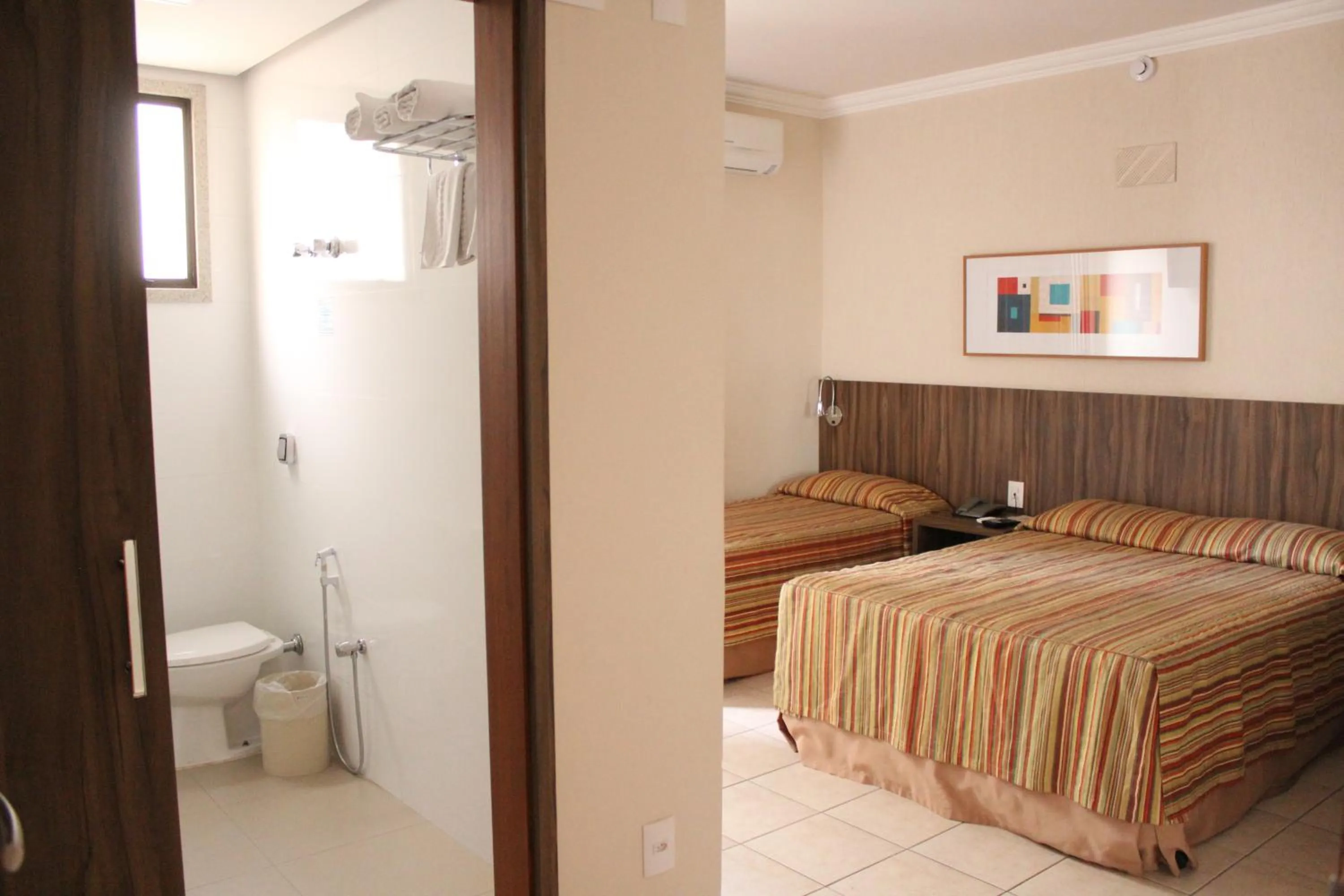 Bed in Hotel Riviera