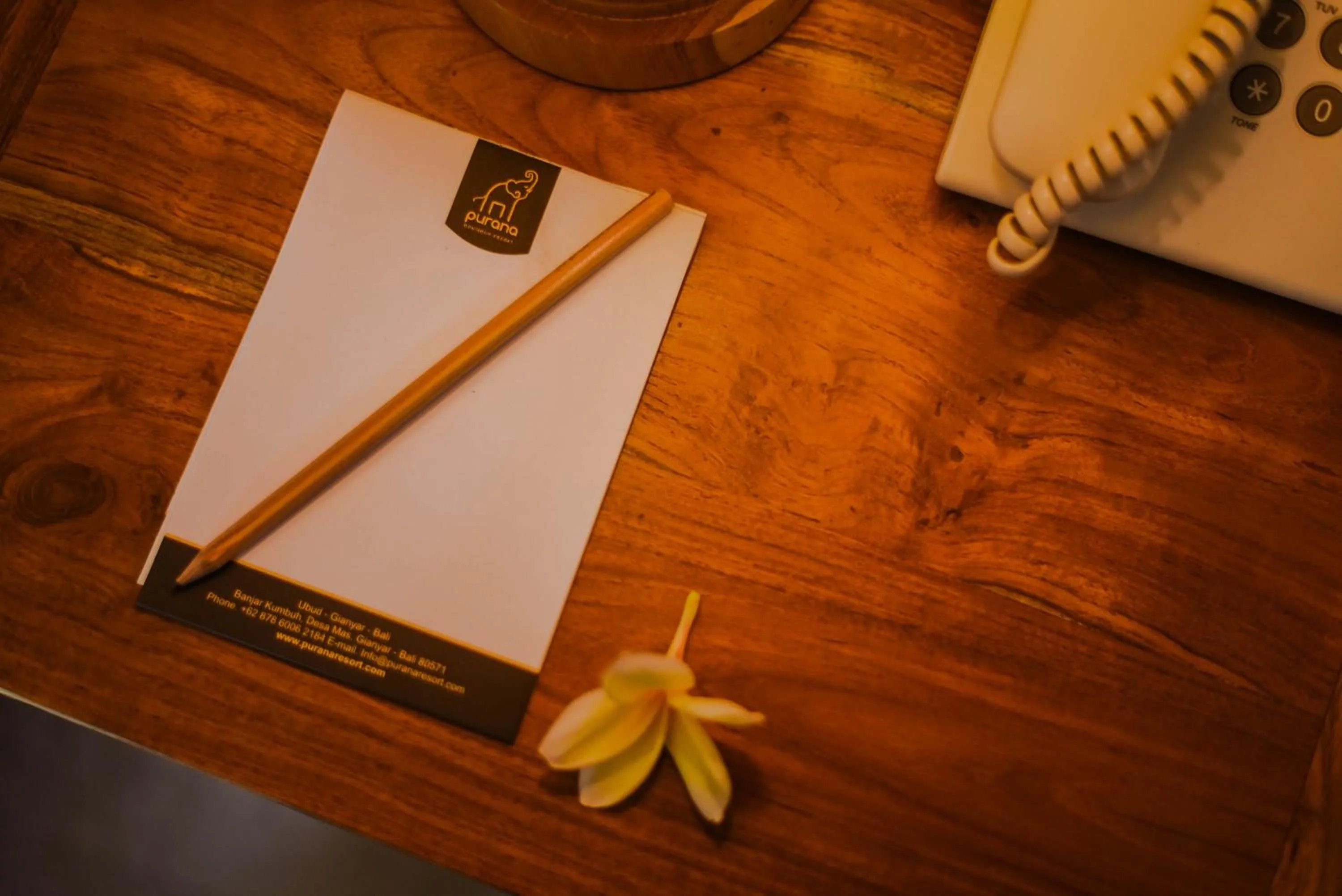 Property logo or sign in Purana Suite Ubud