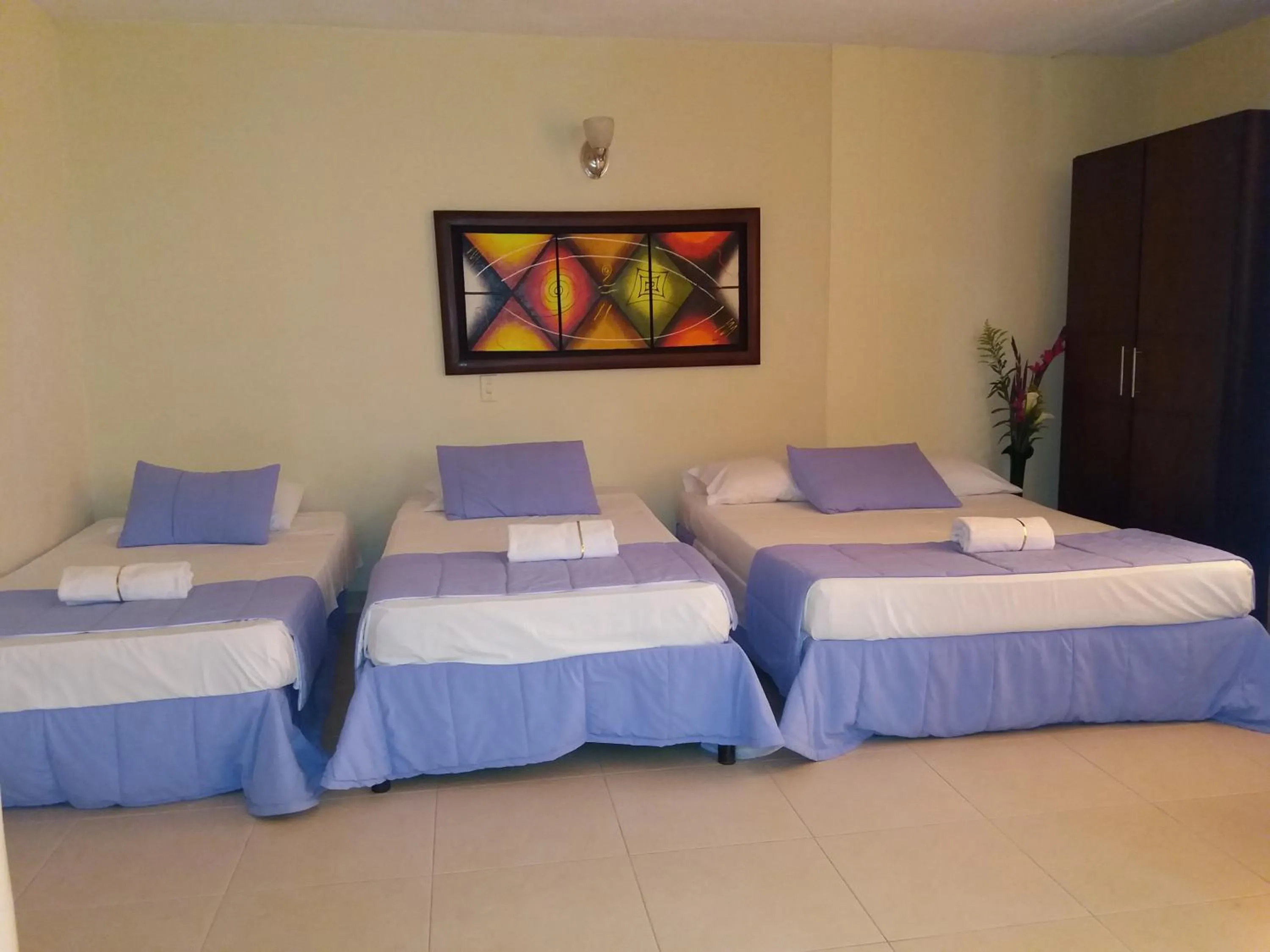 Bed in Hotel Tumburagua Soin Sas