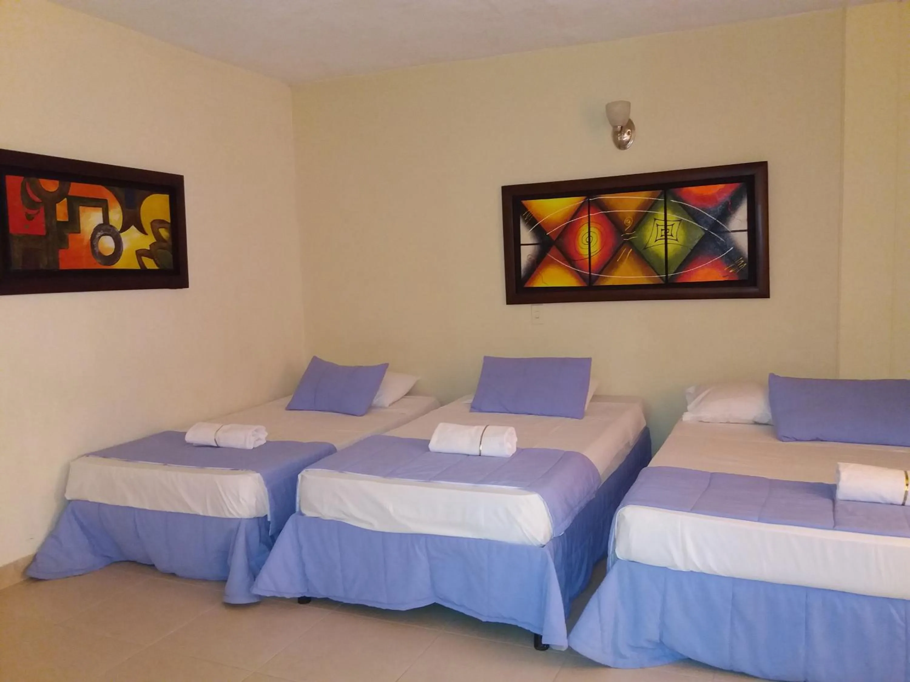 Bed in Hotel Tumburagua Soin Sas