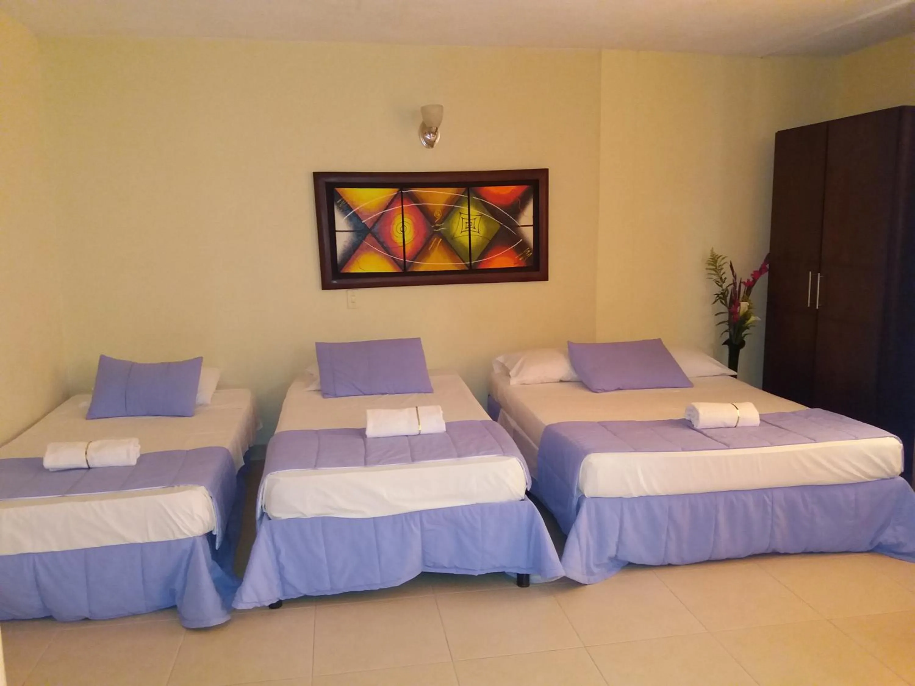 Bed in Hotel Tumburagua Soin Sas