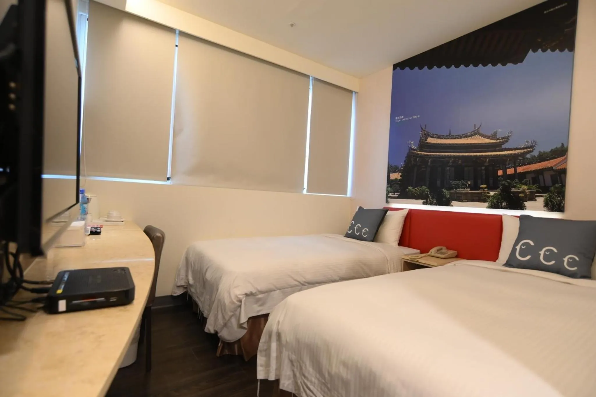 Bed in CU Hotel Taipei