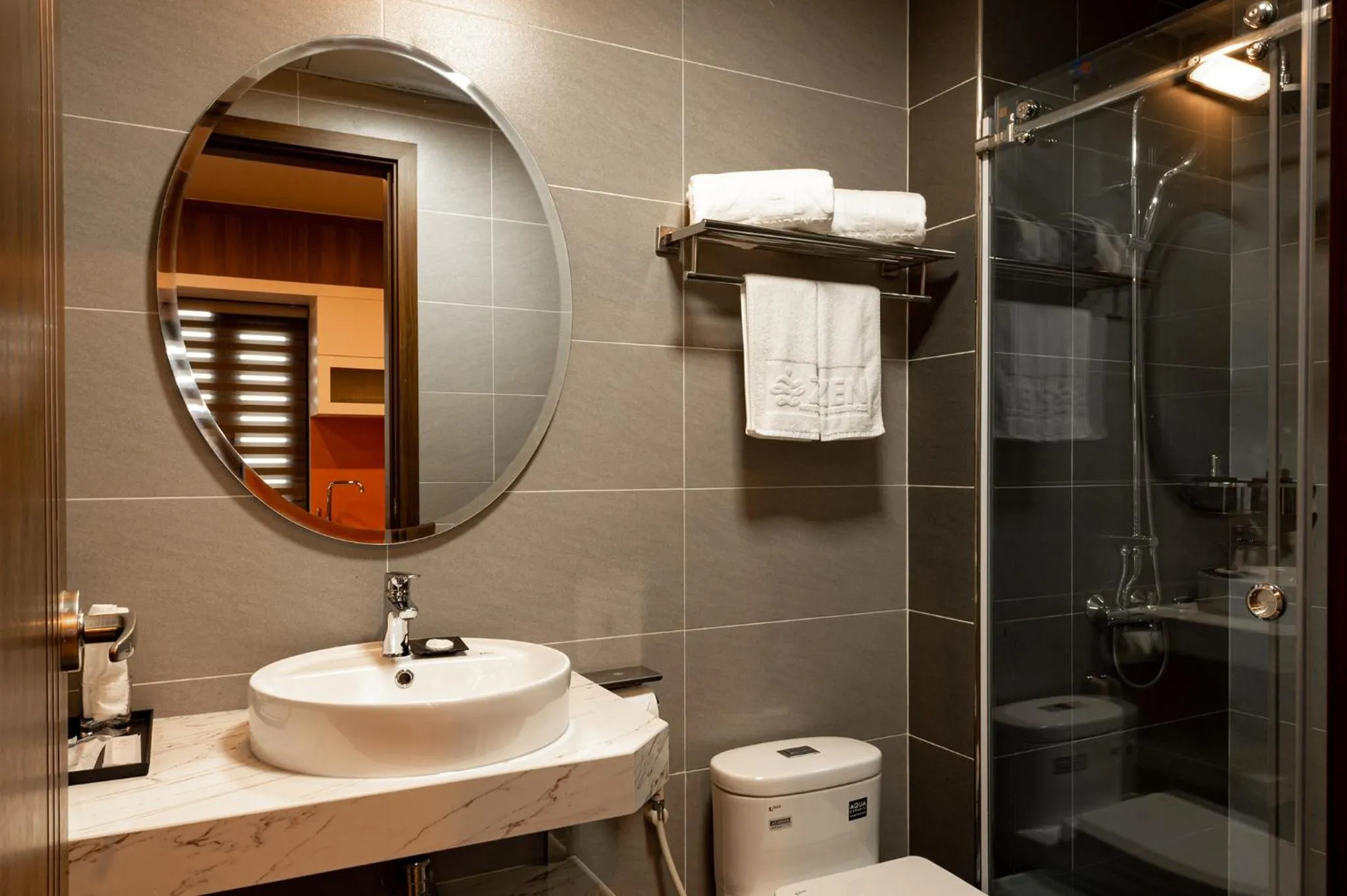 Shower in ZEN RIVERSIDE HOTEL & RESIDENCES