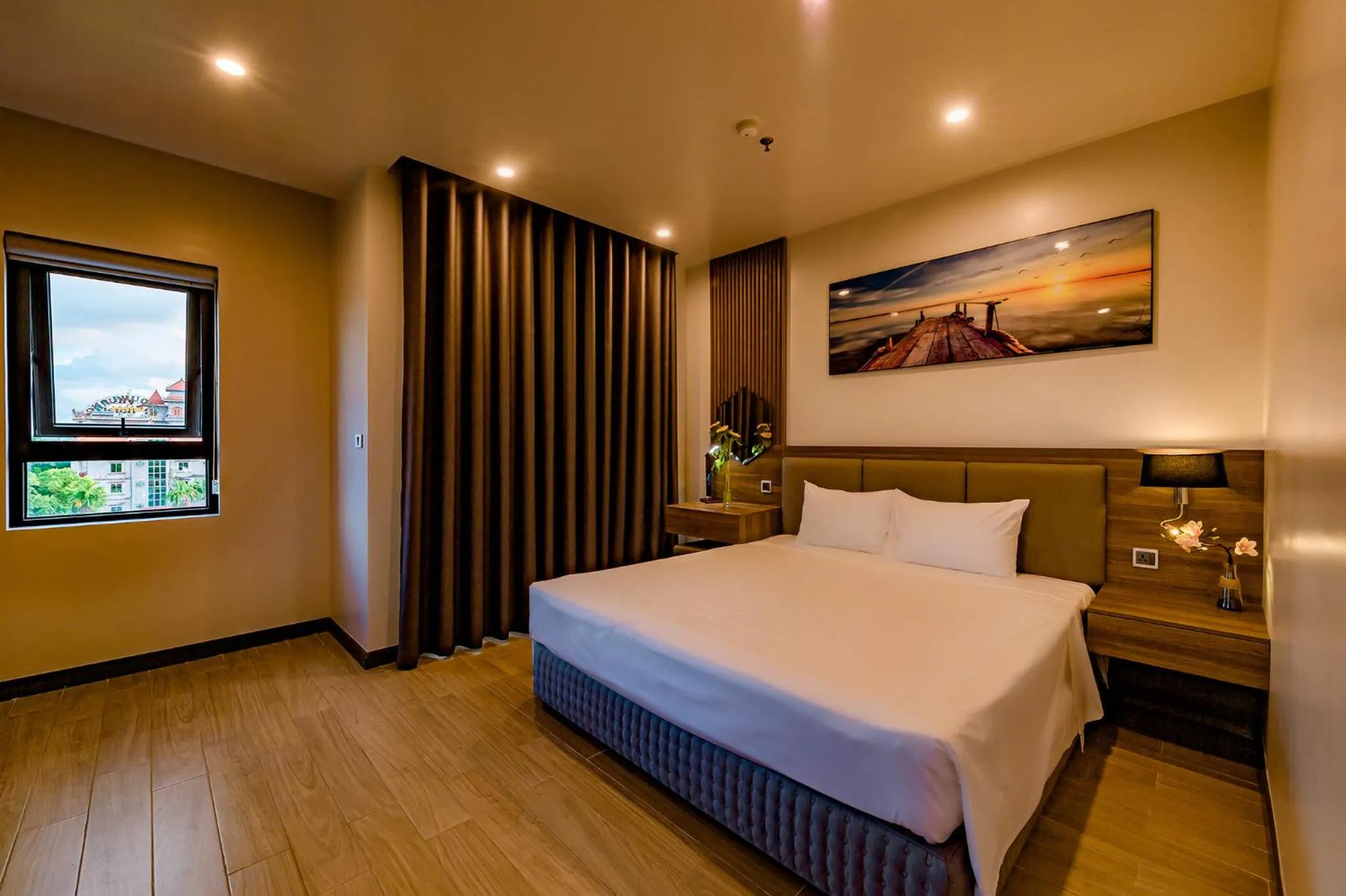 Bed in ZEN RIVERSIDE HOTEL & RESIDENCES