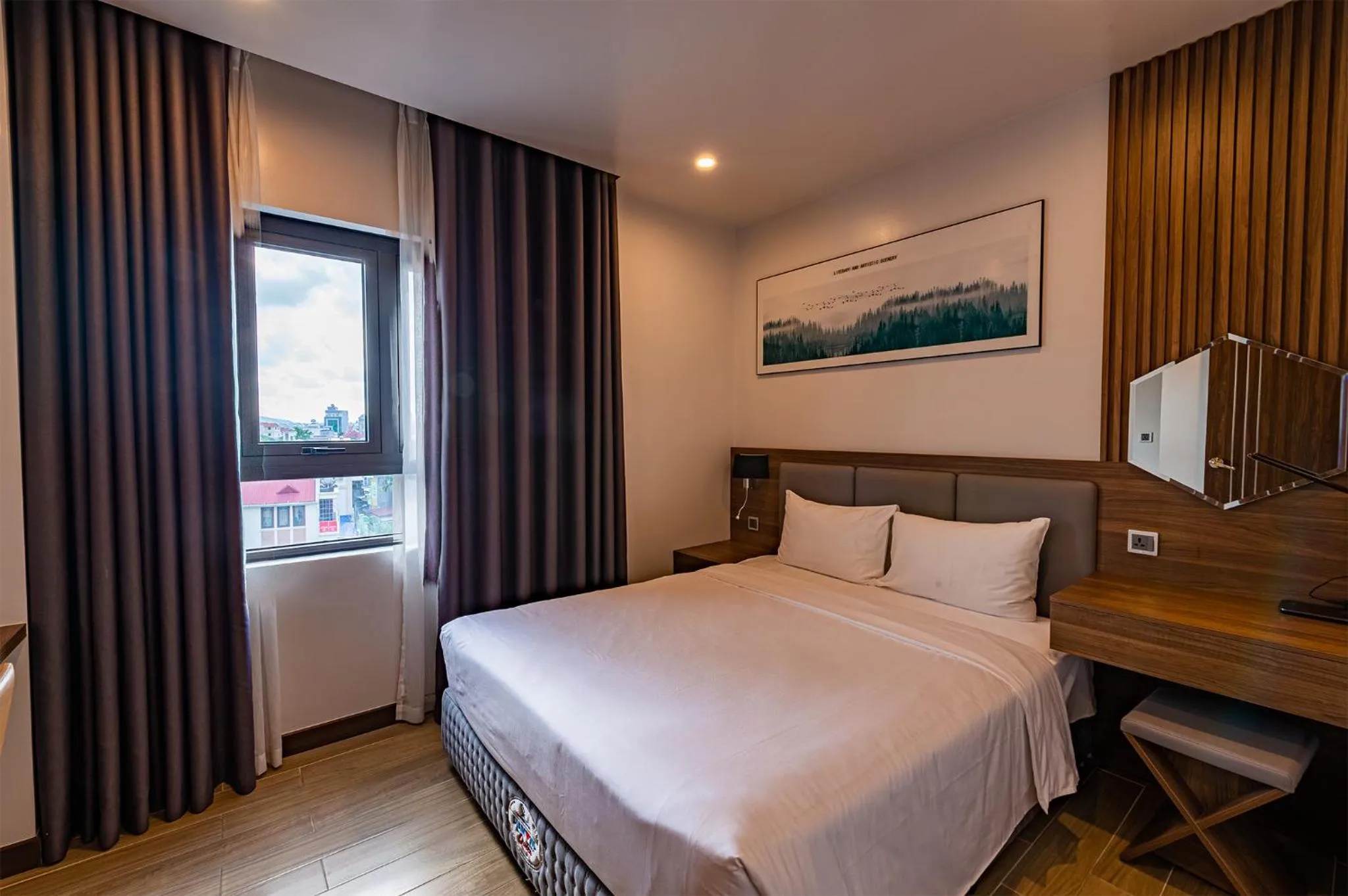 Bed in ZEN RIVERSIDE HOTEL & RESIDENCES