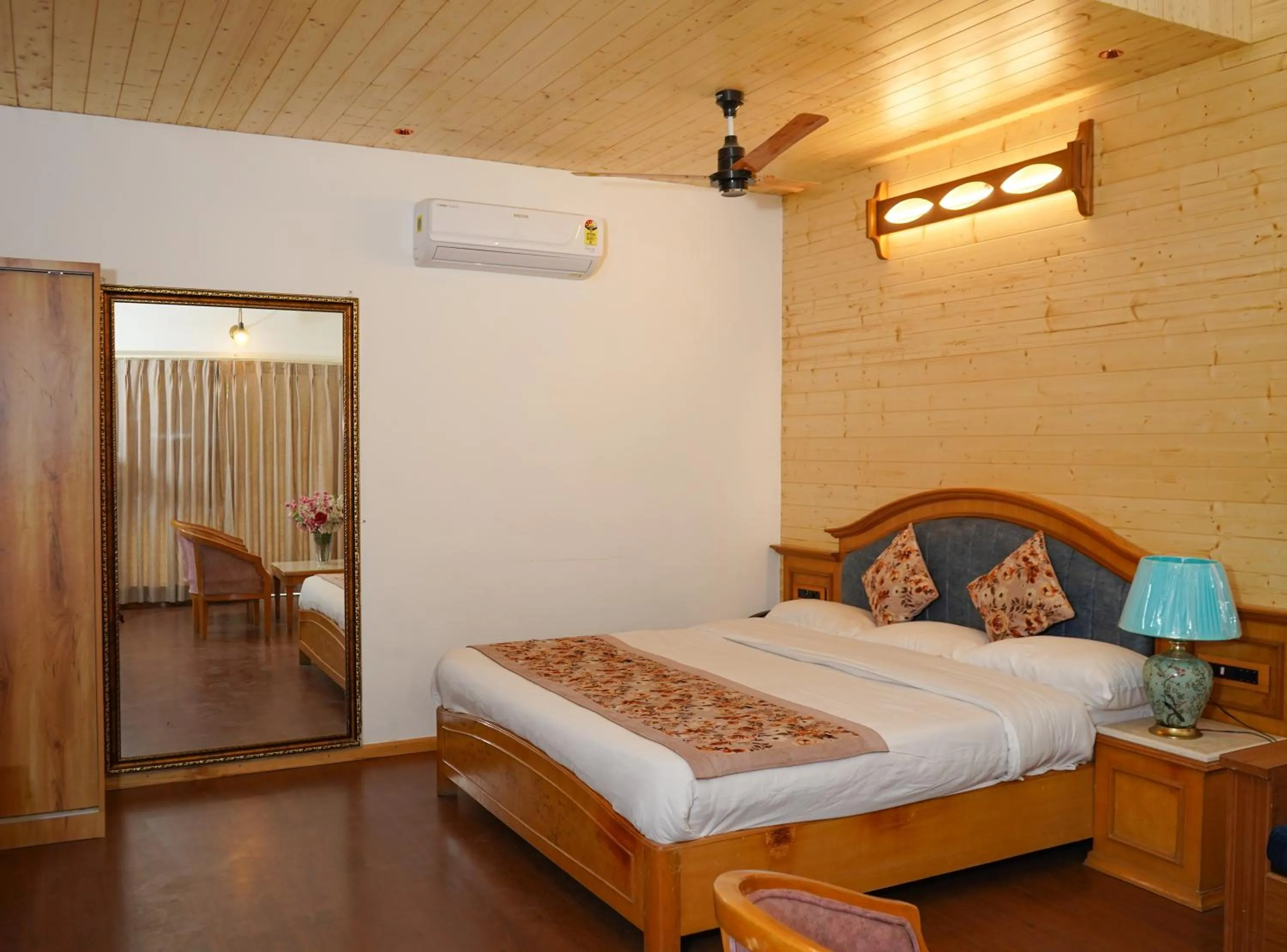 Photo of the whole room in Neelesh Inn- A Luxury Lake View Hotel- 20 kms from Nainital