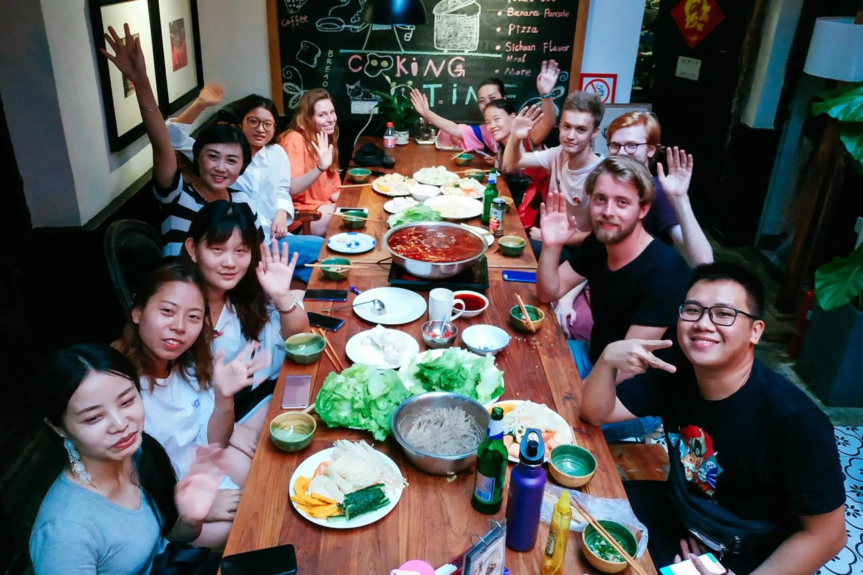 Communal lounge/ TV room in Chengdu Mix Hostel - Next To Wenshu Monastery - Sichuan Style Chill & Social Courtyard House - Free Activities - Friendly English Speaking Staff - Tibet, Panda, Buddha & Snow Mountain Tours