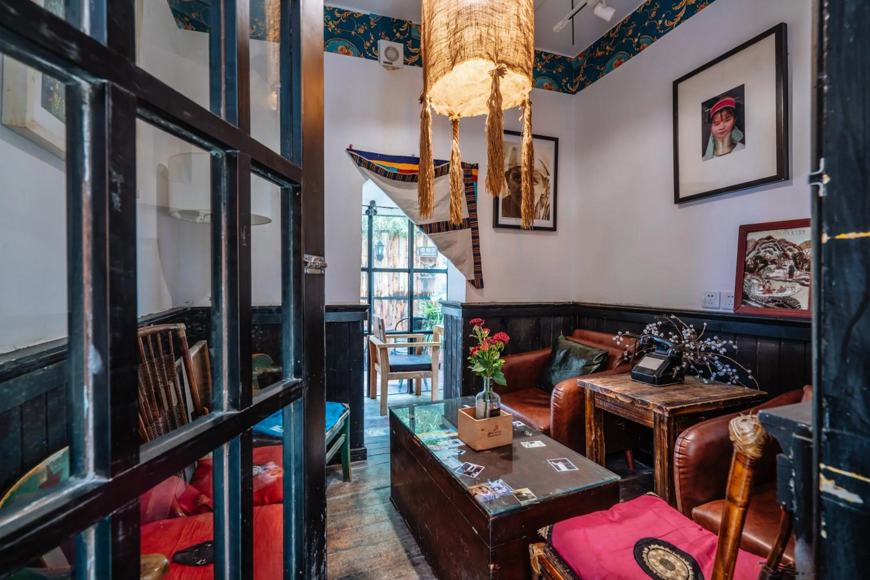 Seating area in Chengdu Mix Hostel - Next To Wenshu Monastery - Sichuan Style Chill & Social Courtyard House - Free Activities - Friendly English Speaking Staff - Tibet, Panda, Buddha & Snow Mountain Tours