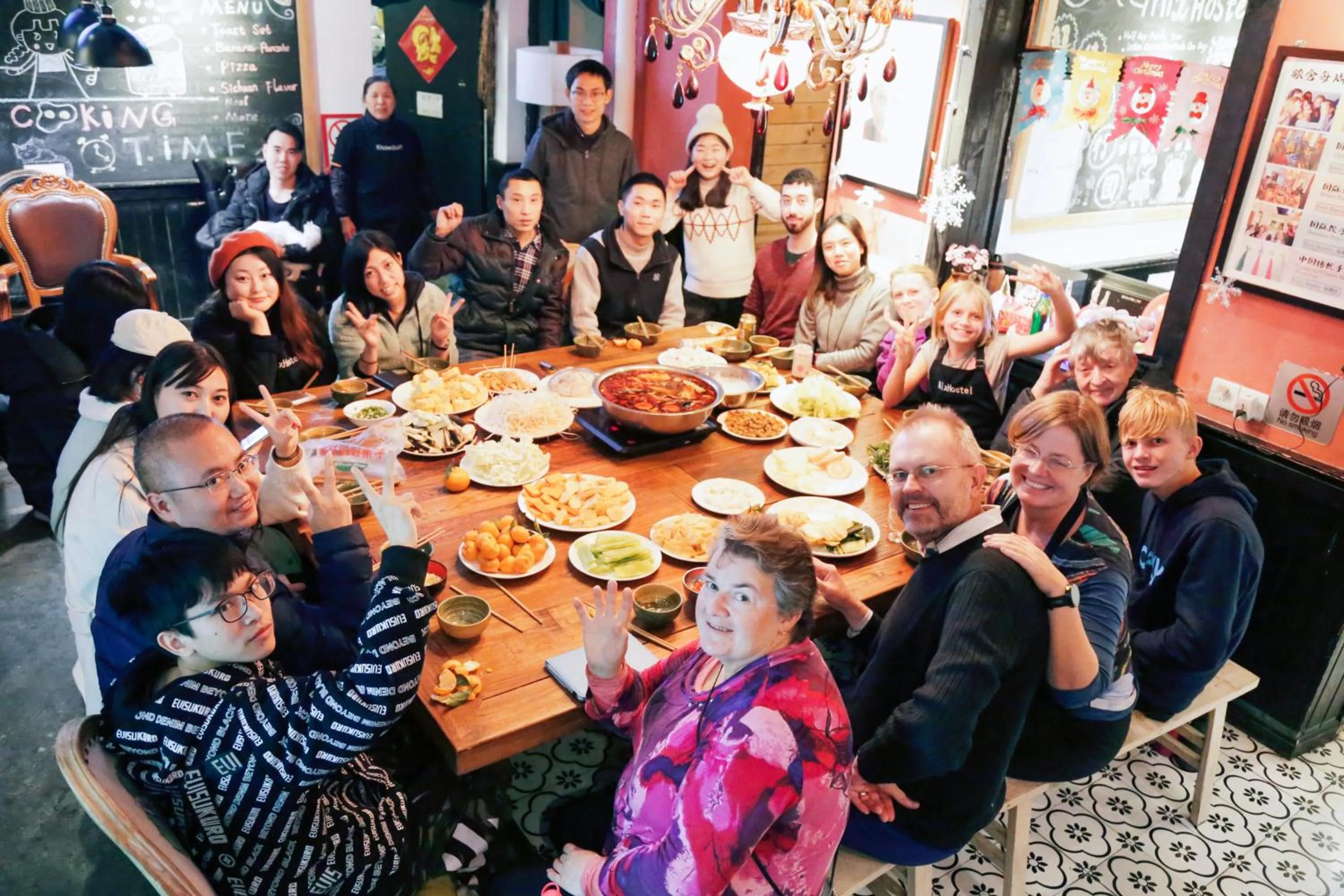 Communal lounge/ TV room in Chengdu Mix Hostel - Next To Wenshu Monastery - Sichuan Style Chill & Social Courtyard House - Free Activities - Friendly English Speaking Staff - Tibet, Panda, Buddha & Snow Mountain Tours