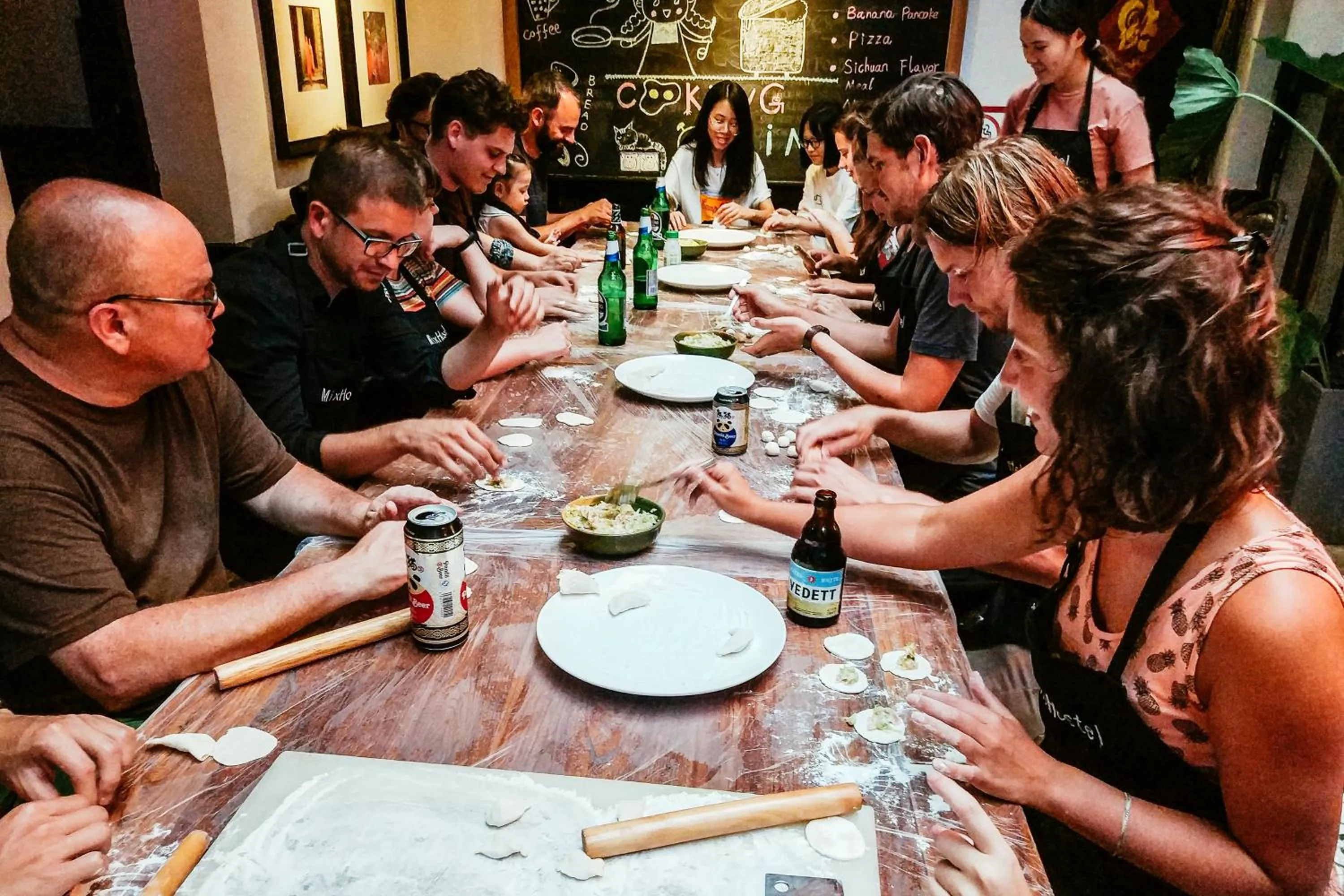 Communal lounge/ TV room in Chengdu Mix Hostel - Next To Wenshu Monastery - Sichuan Style Chill & Social Courtyard House - Free Activities - Friendly English Speaking Staff - Tibet, Panda, Buddha & Snow Mountain Tours