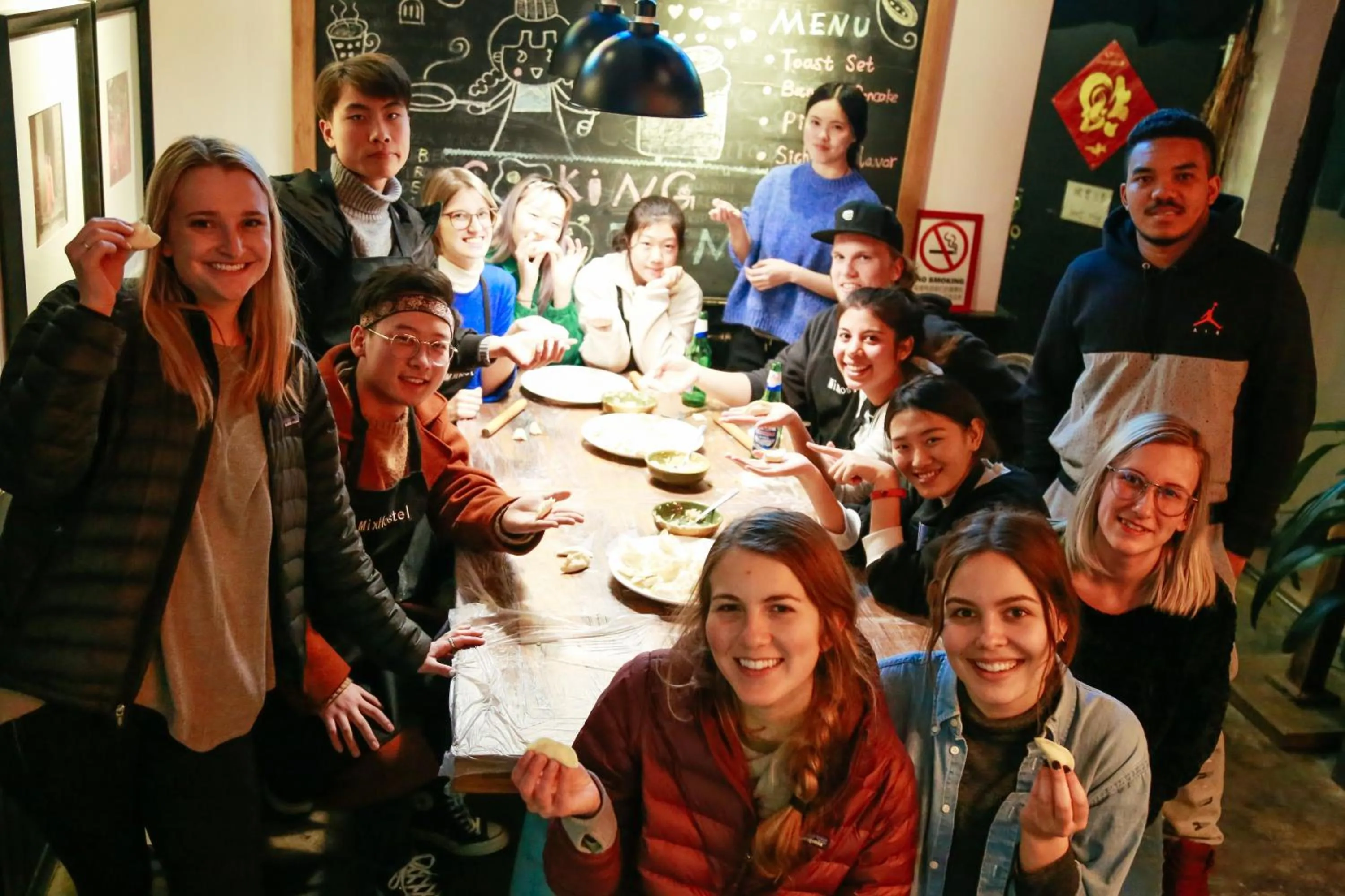 Communal lounge/ TV room in Chengdu Mix Hostel - Next To Wenshu Monastery - Sichuan Style Chill & Social Courtyard House - Free Activities - Friendly English Speaking Staff - Tibet, Panda, Buddha & Snow Mountain Tours