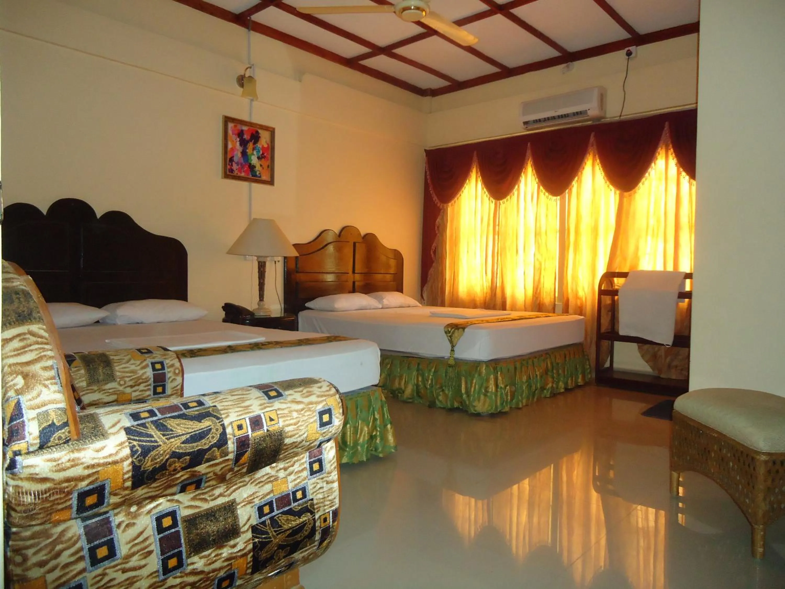 Photo of the whole room, Bed in Green Grass Hotel & Restaurant