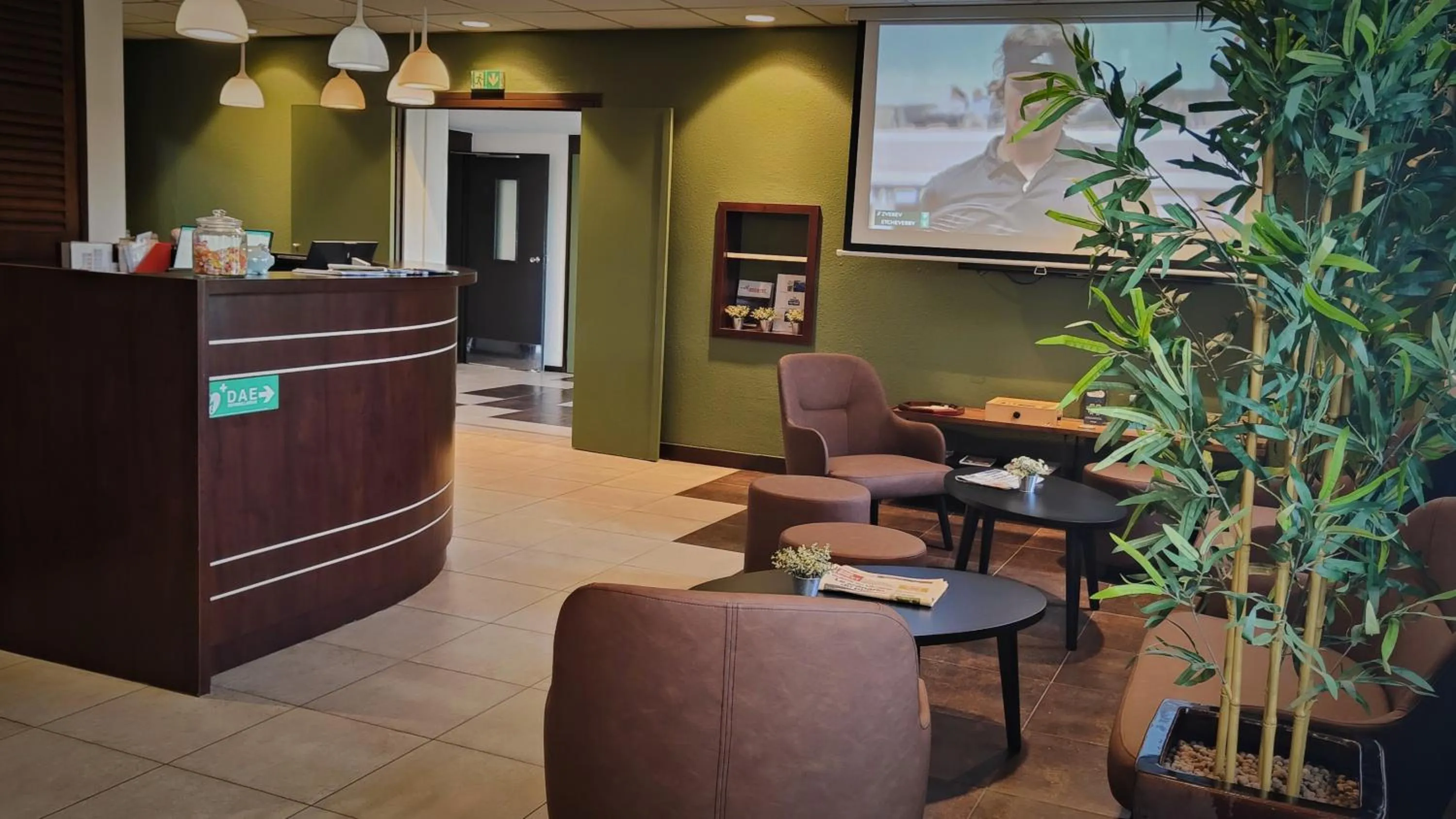 Communal lounge/ TV room in Kyriad Libourne Saint Emilion