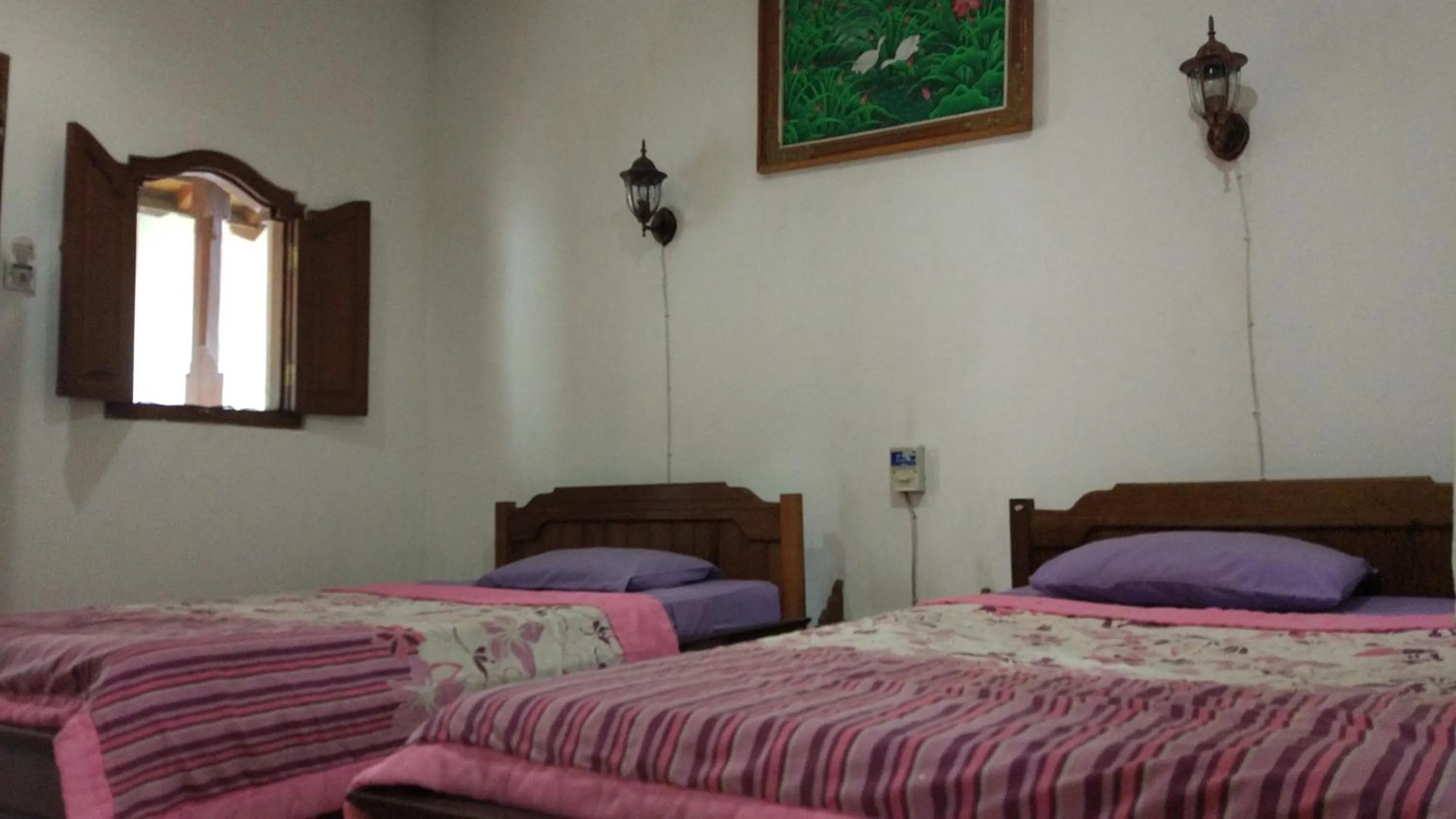 Bed in Puri Bebengan Bungalows