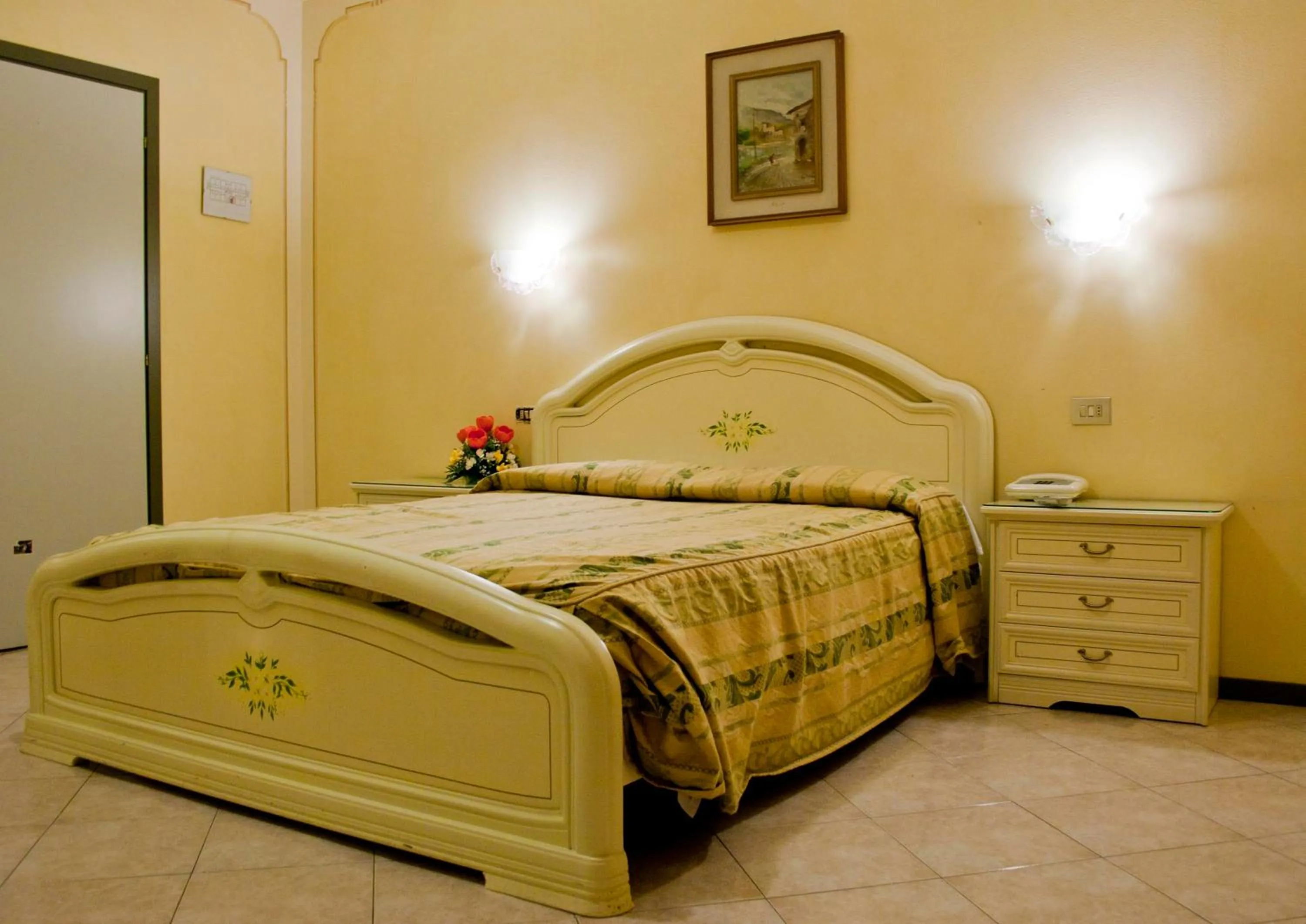 Bed in Hotel Michelangelo