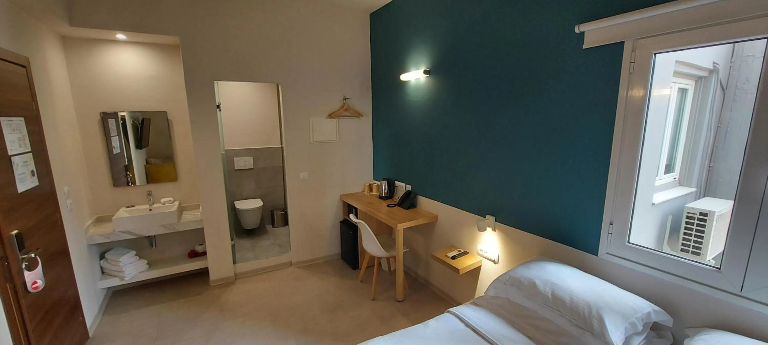 Bed in The Convo Athens Riviera