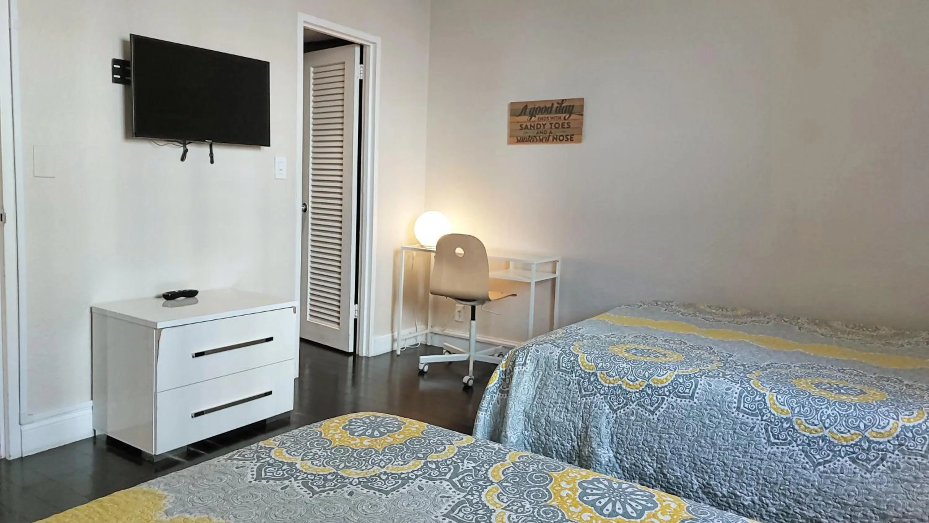 Bedroom, Bed in The Tides Apartments on the beach