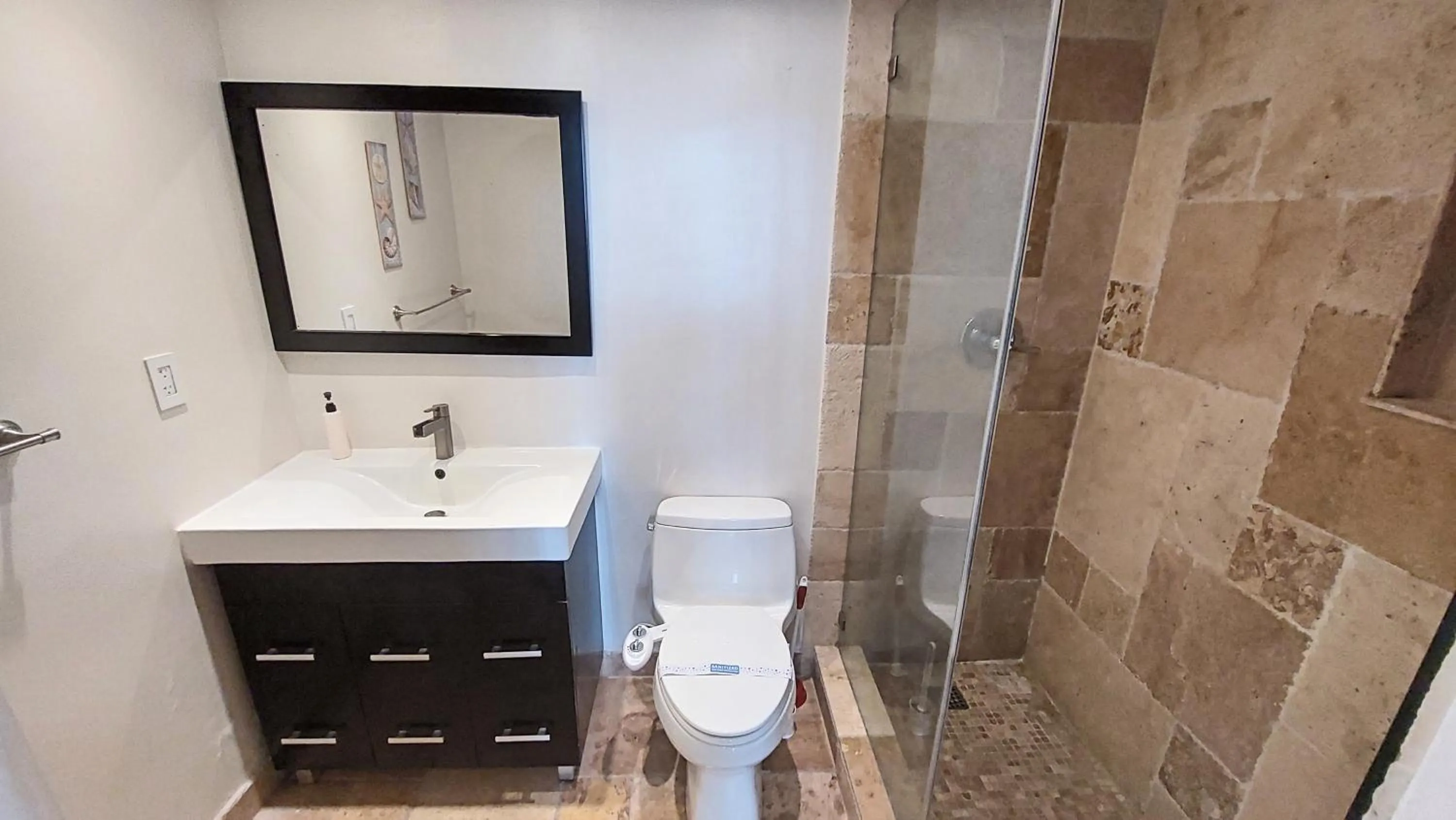 Bathroom in The Tides Apartments on the beach