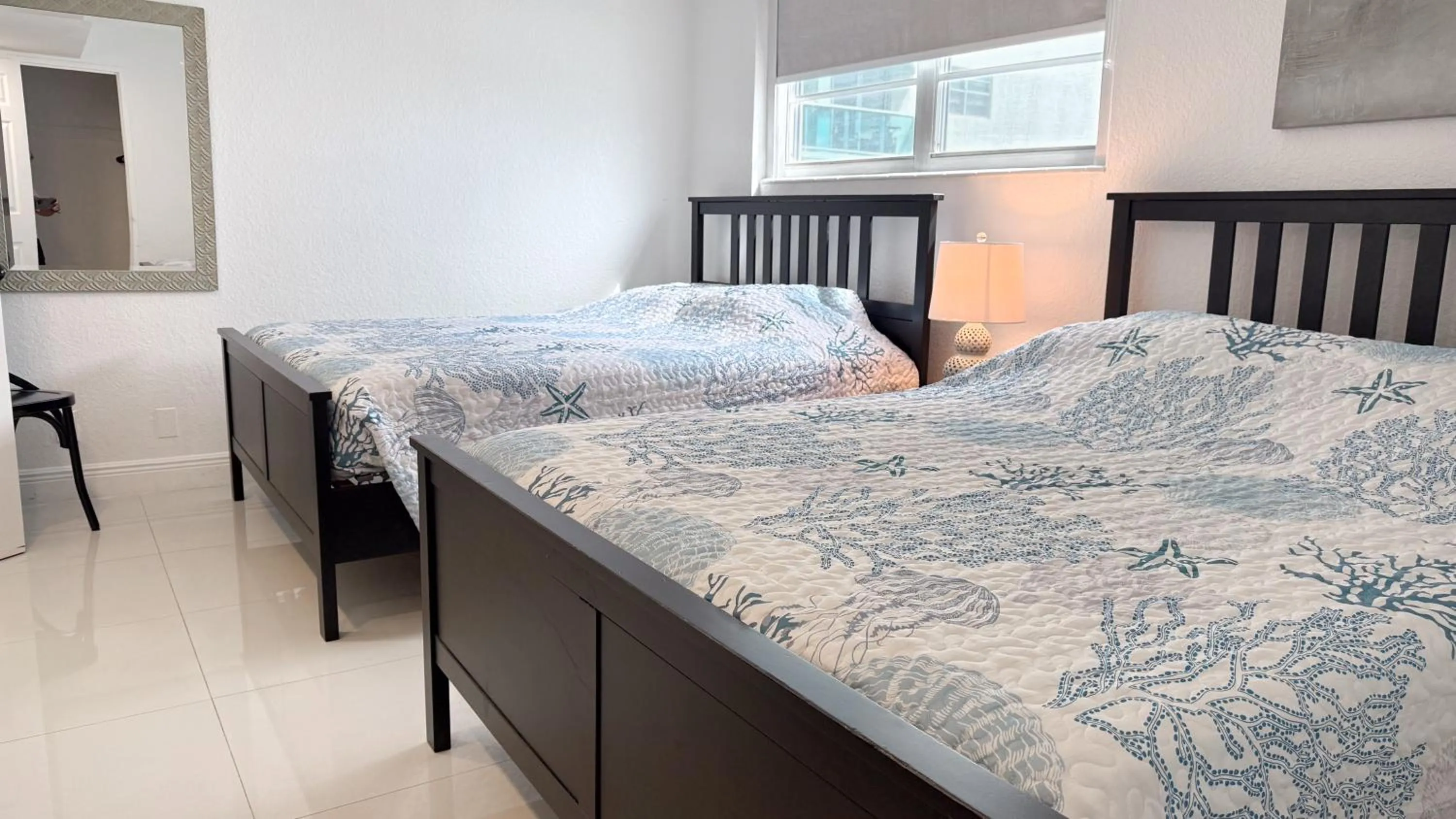 Bedroom, Bed in The Tides Apartments on the beach