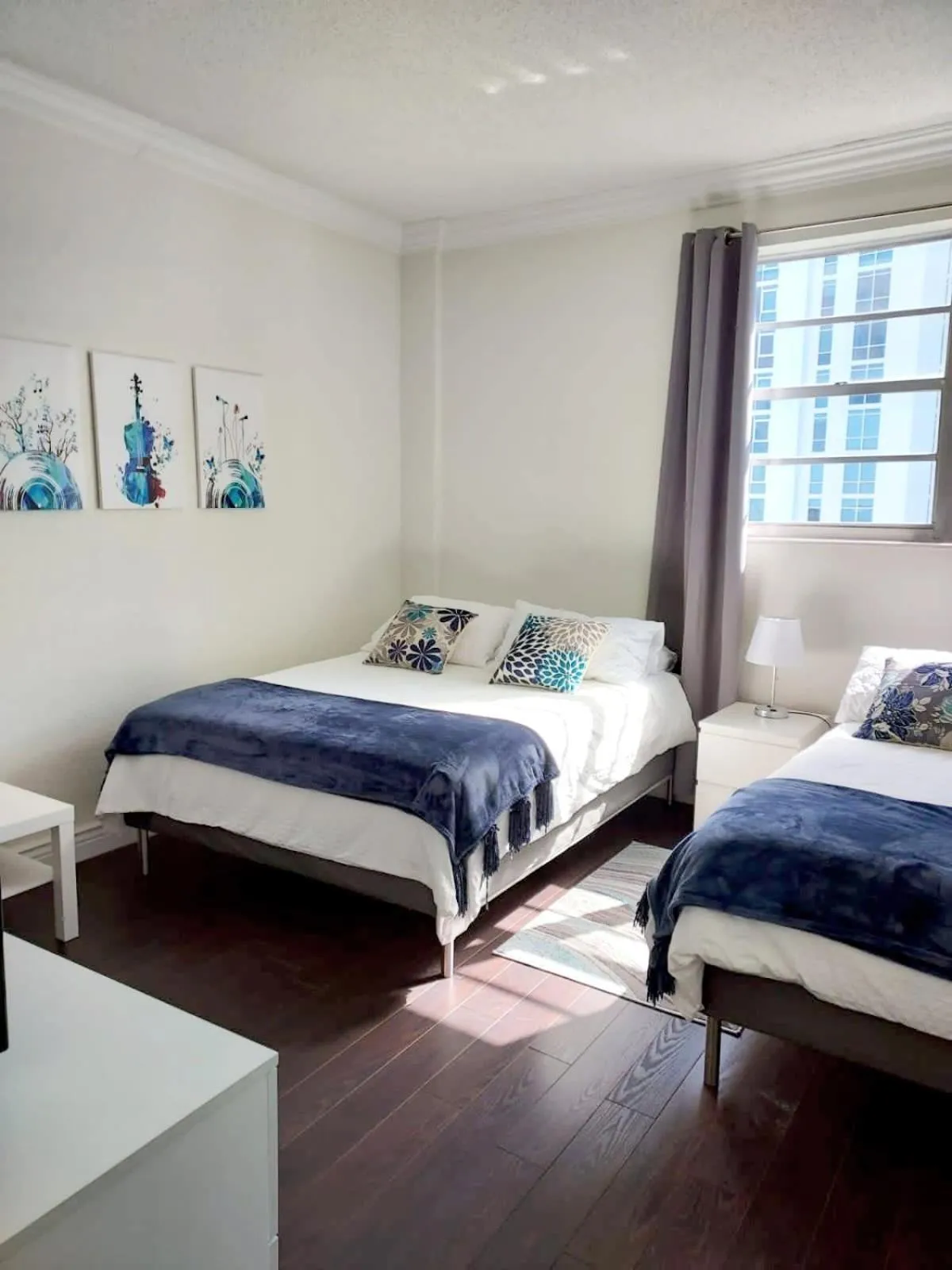 Bedroom, Bed in The Tides Apartments on the beach