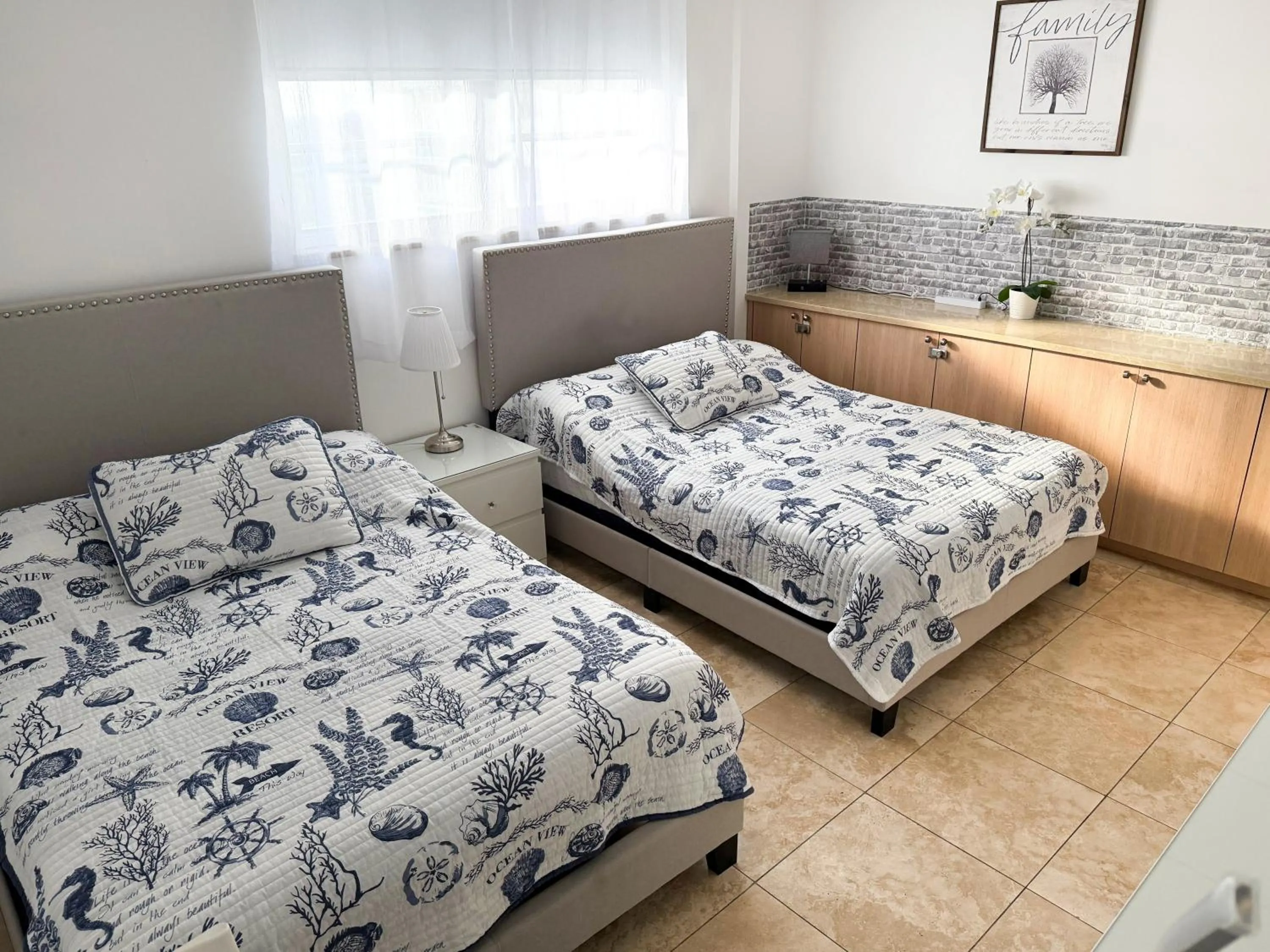 Bedroom, Bed in The Tides Apartments on the beach