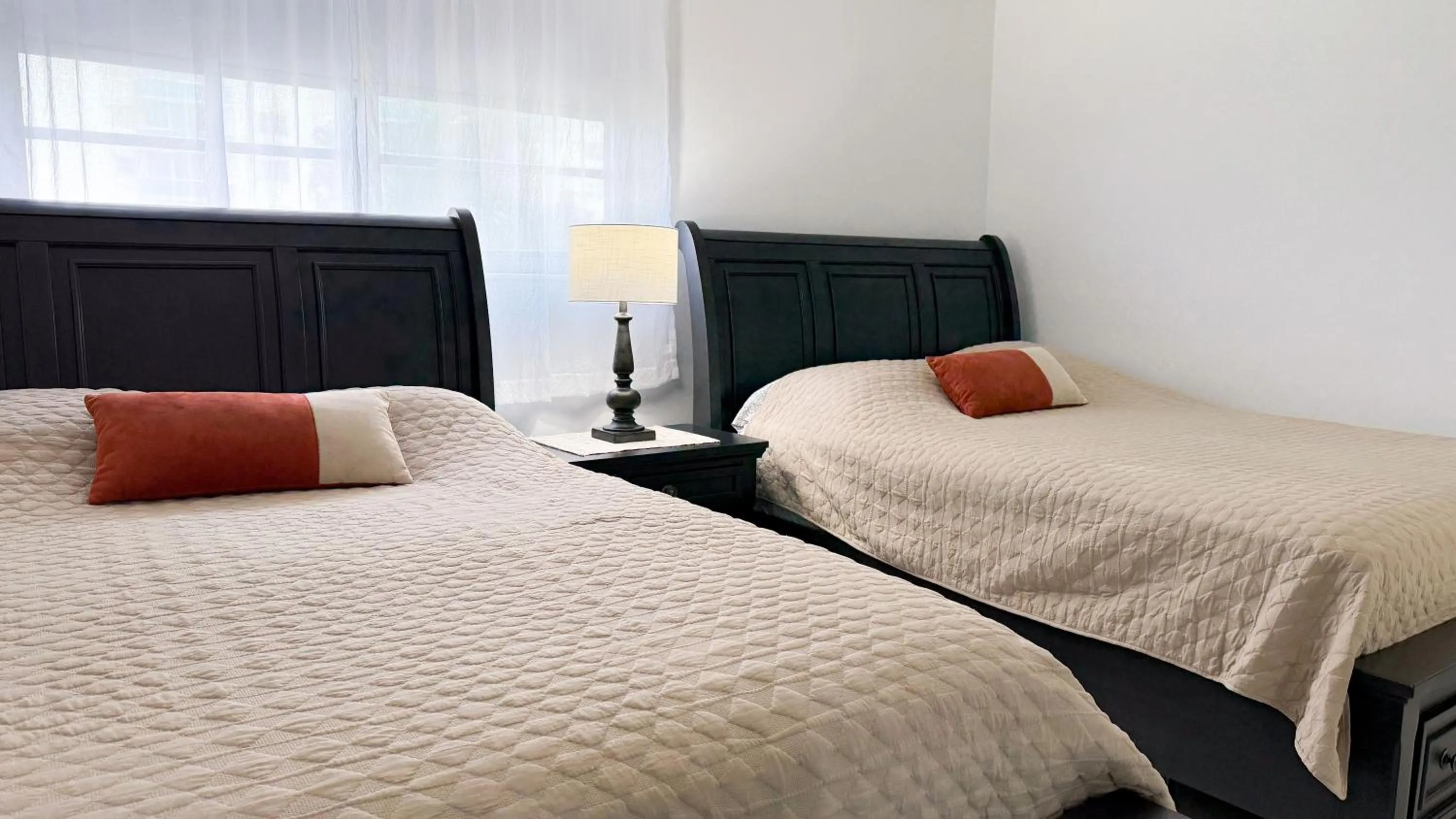 Bedroom, Bed in The Tides Apartments on the beach