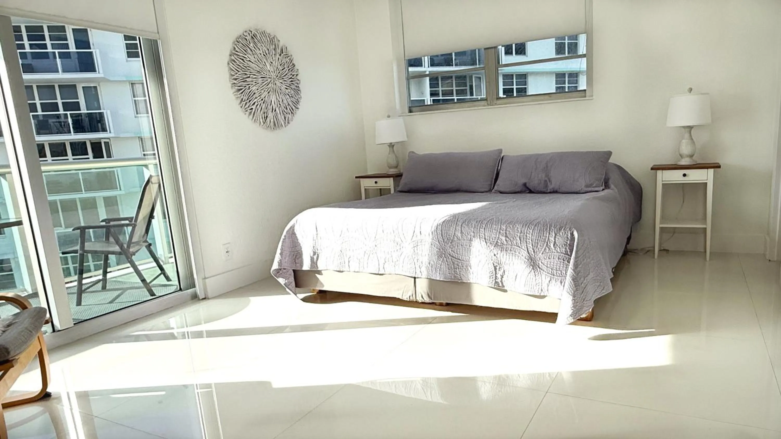 Bedroom, Bed in The Tides Apartments on the beach