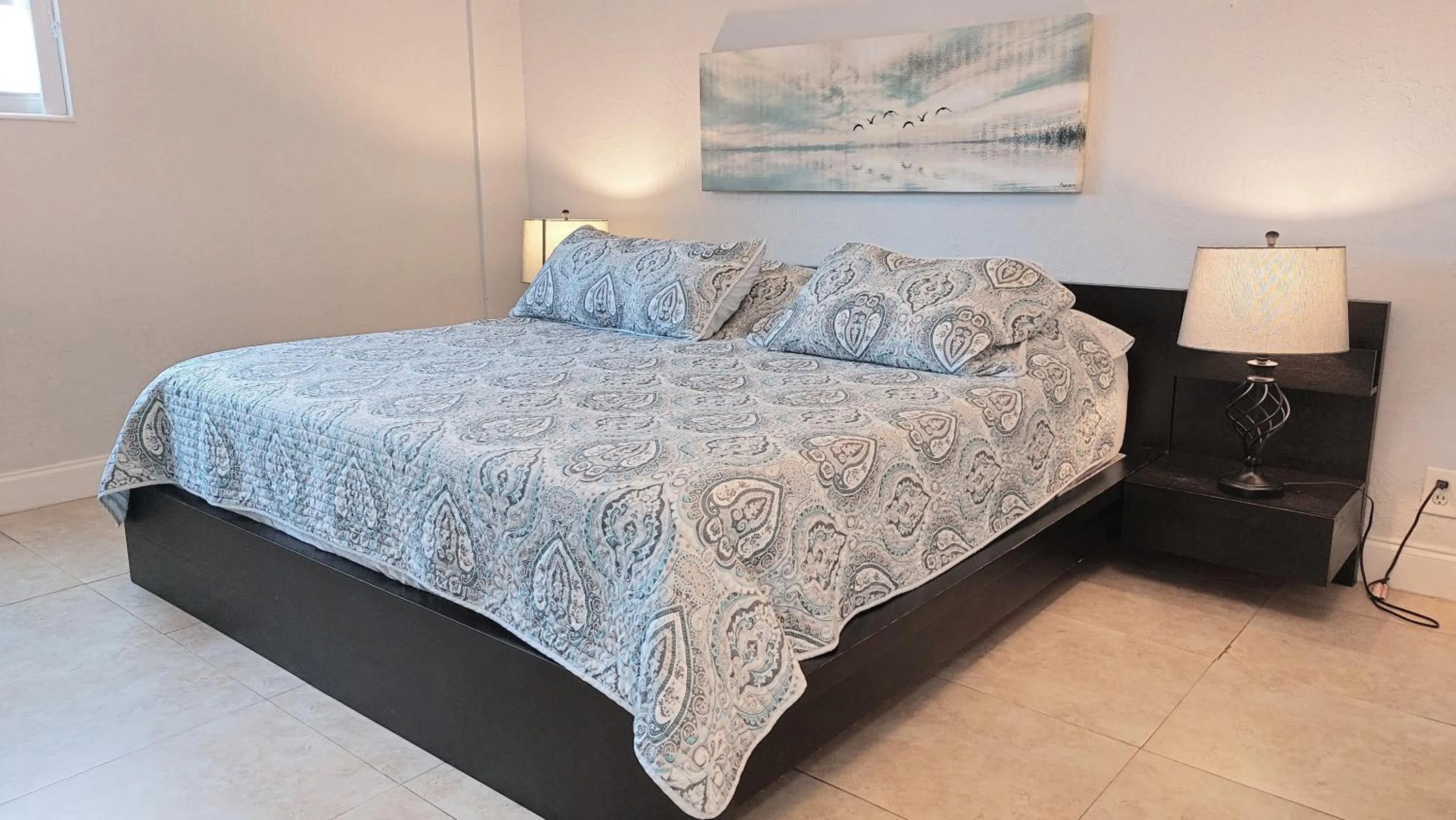 Bedroom, Bed in The Tides Apartments on the beach