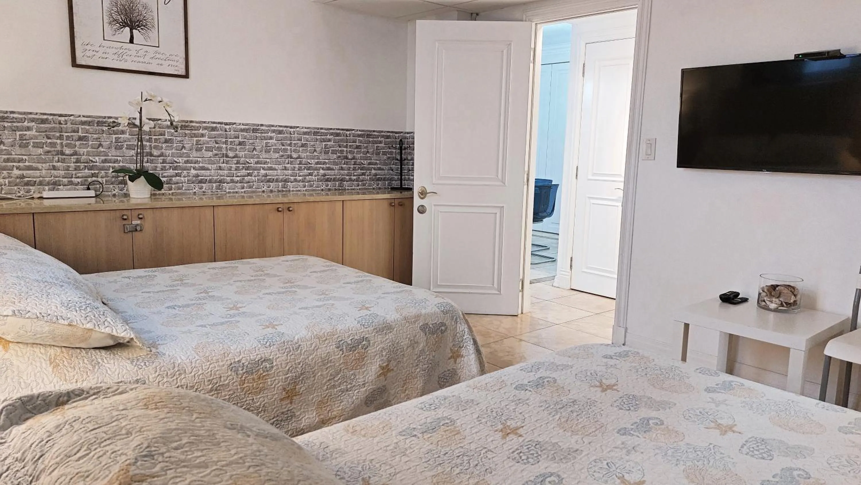 Bedroom, Bed in The Tides Apartments on the beach