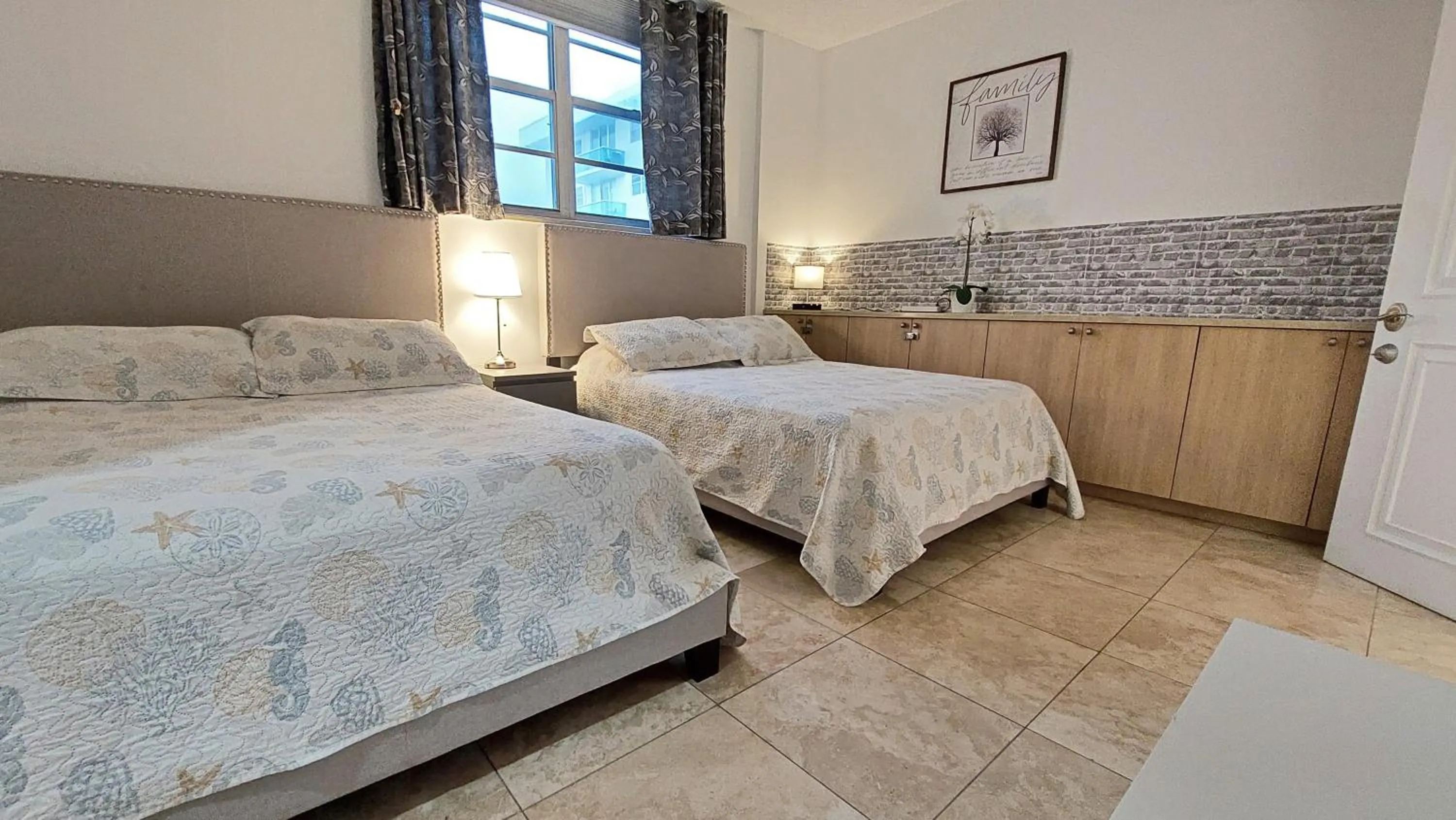 Bedroom, Bed in The Tides Apartments on the beach