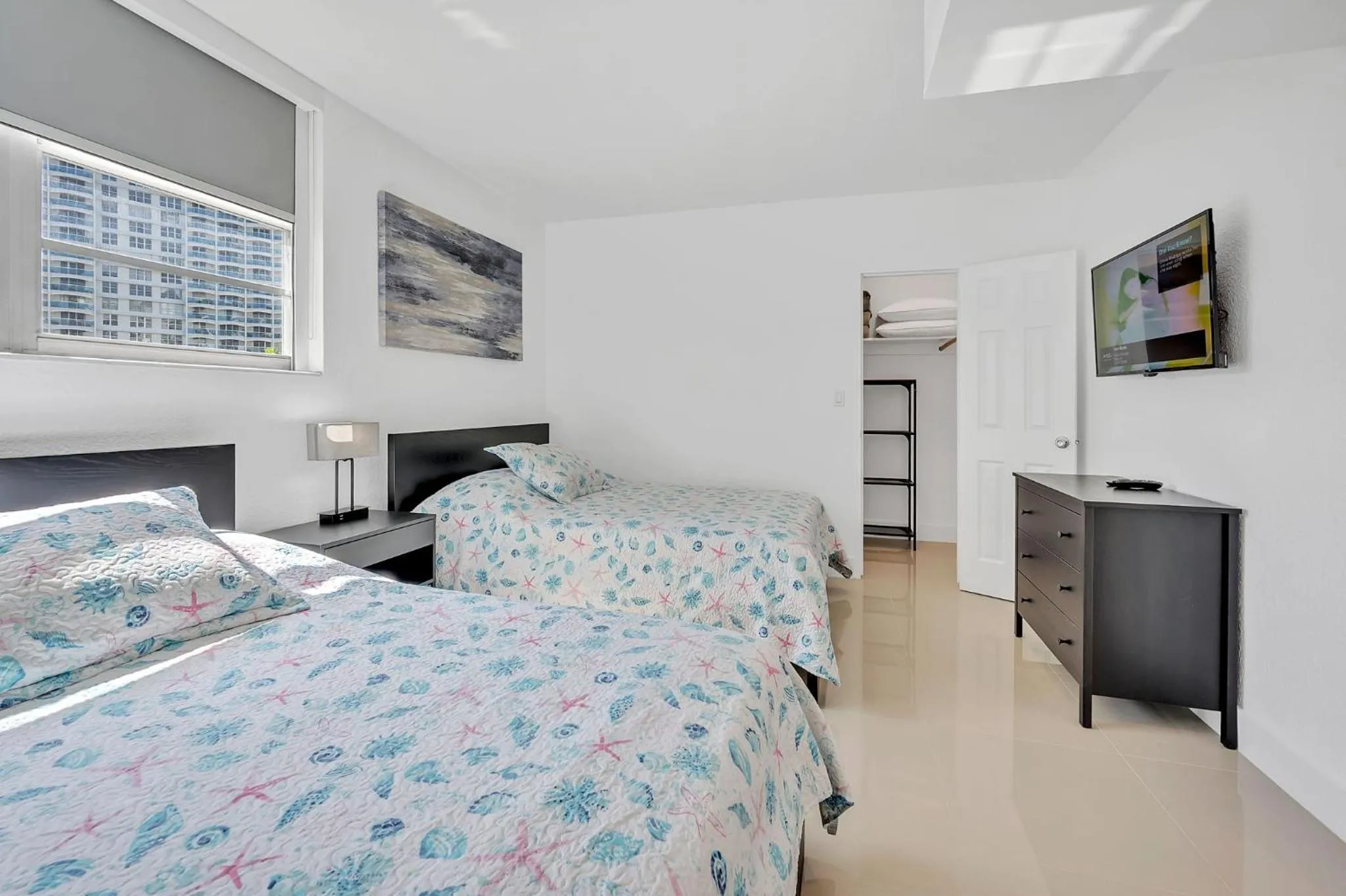 Bedroom, Bed in The Tides Apartments on the beach