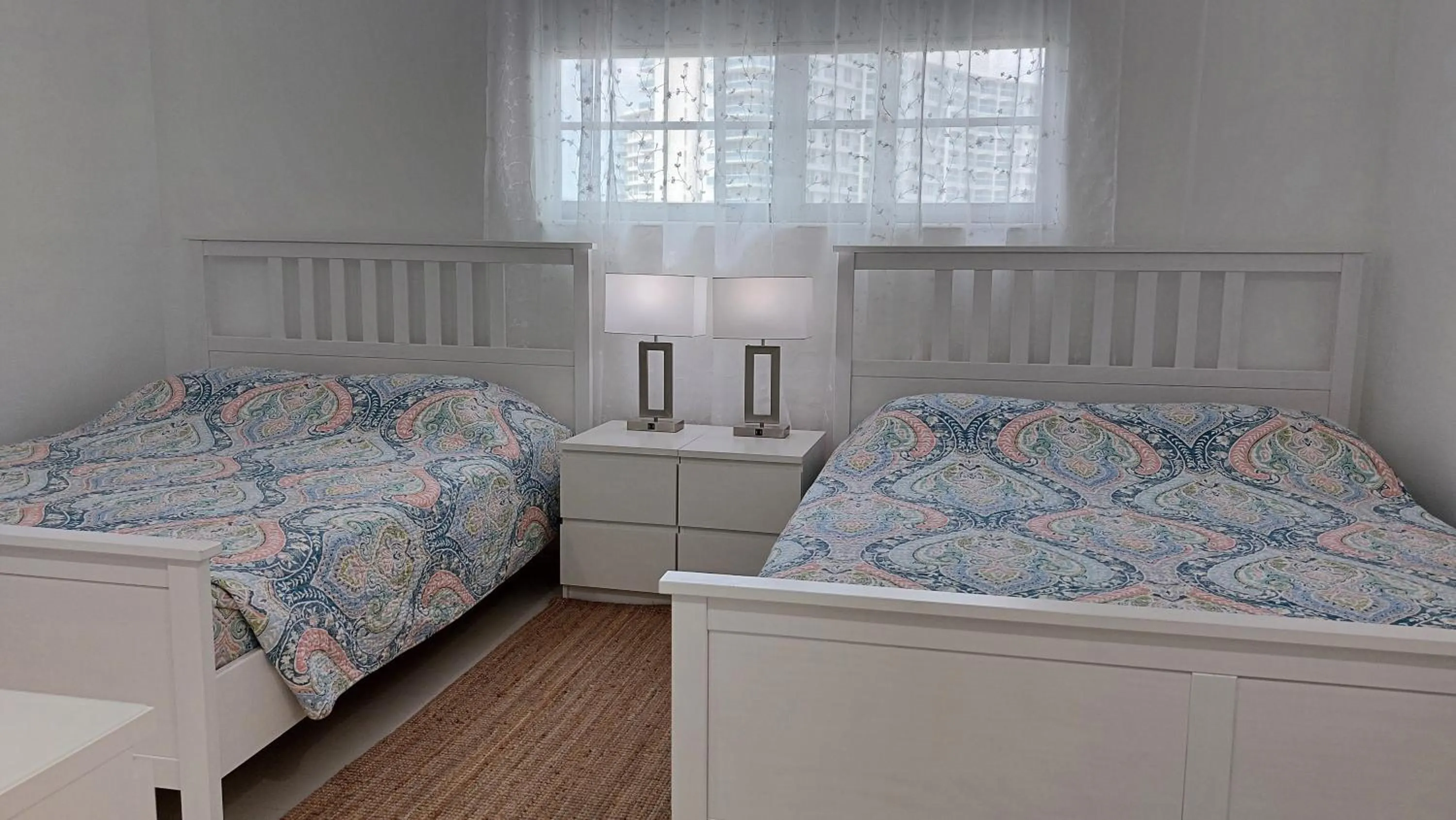 Bedroom, Bed in The Tides Apartments on the beach