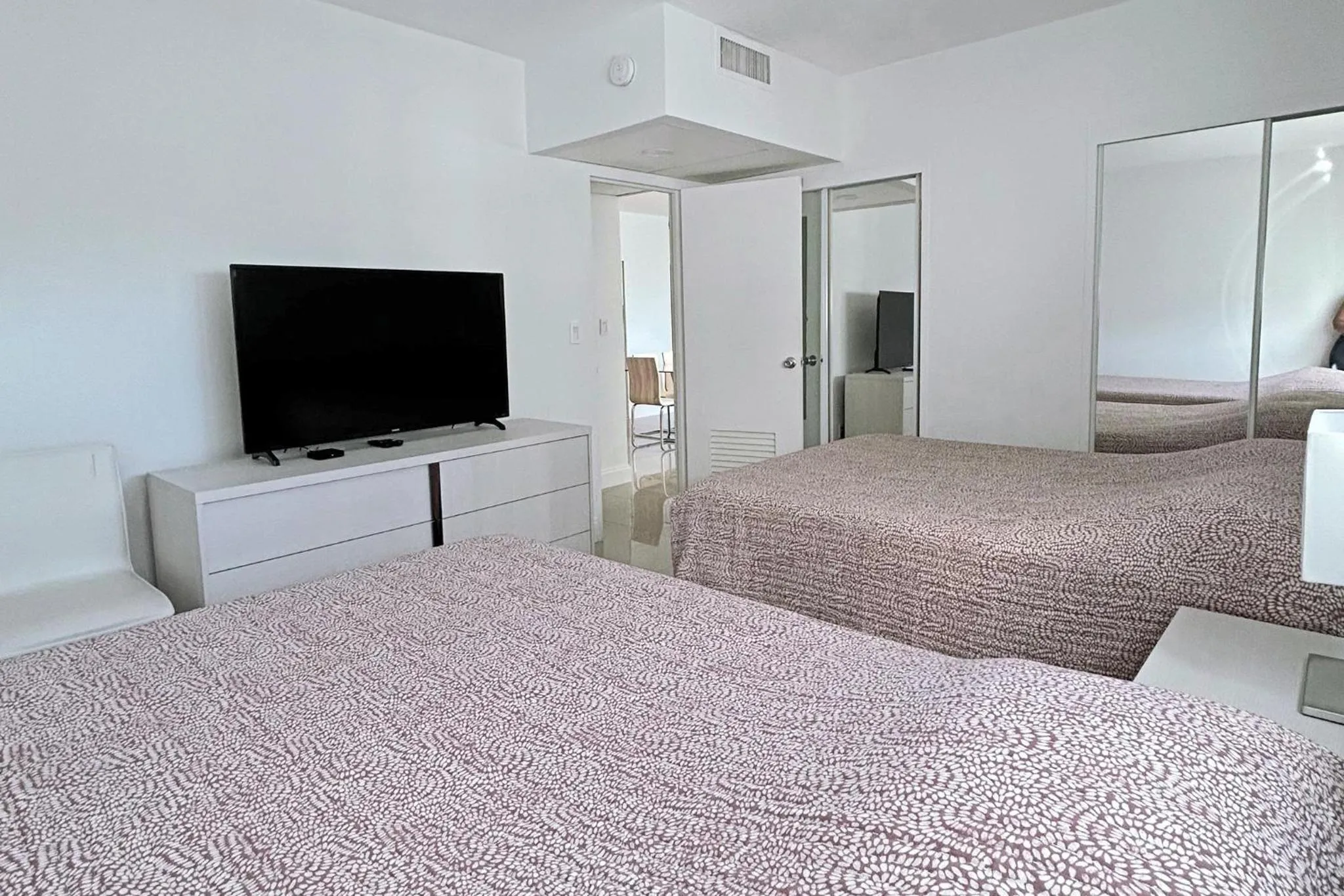 Bedroom, Bed in The Tides Apartments on the beach