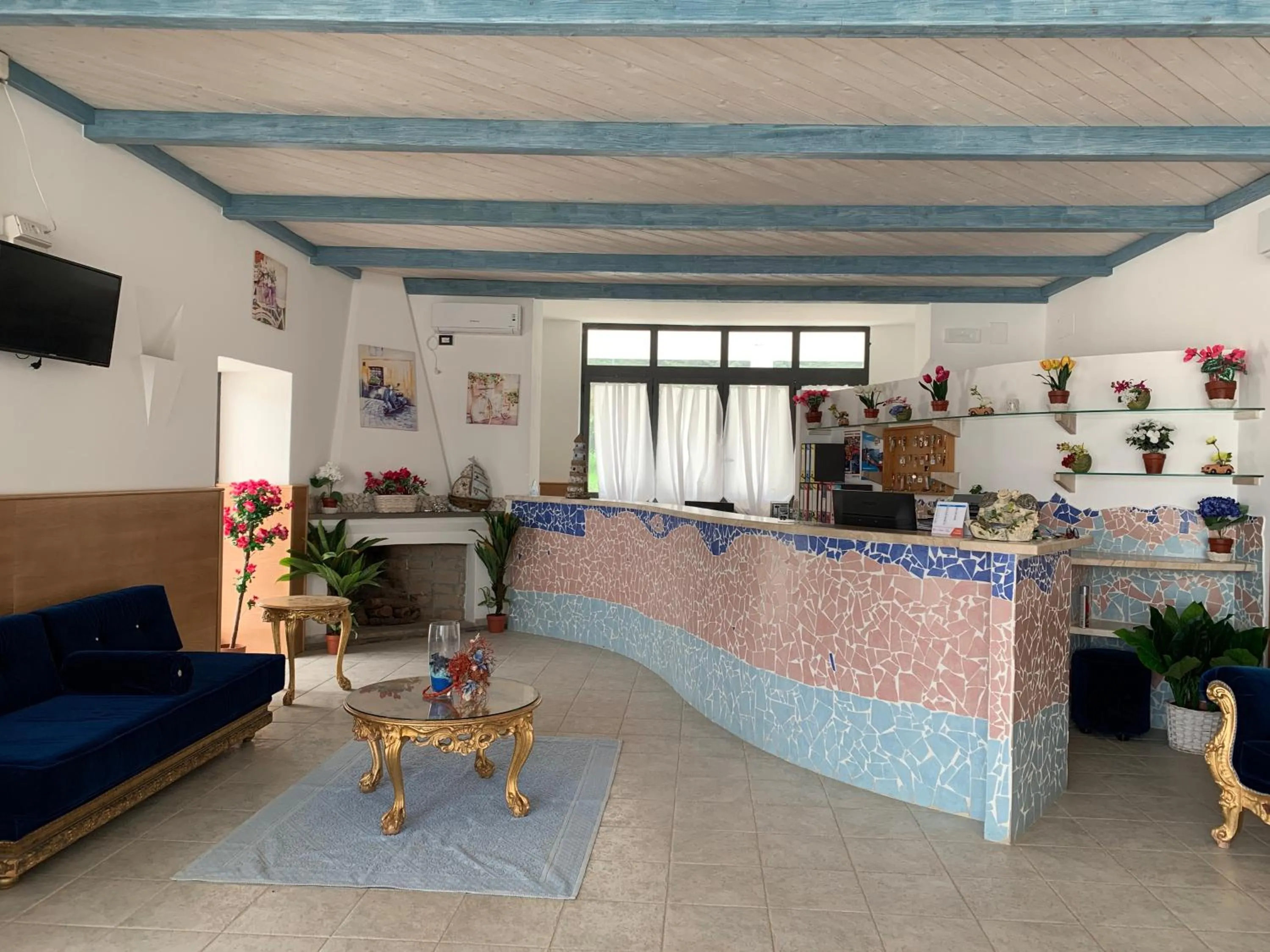 Lobby or reception in Residence Hotel Monte Ricciu