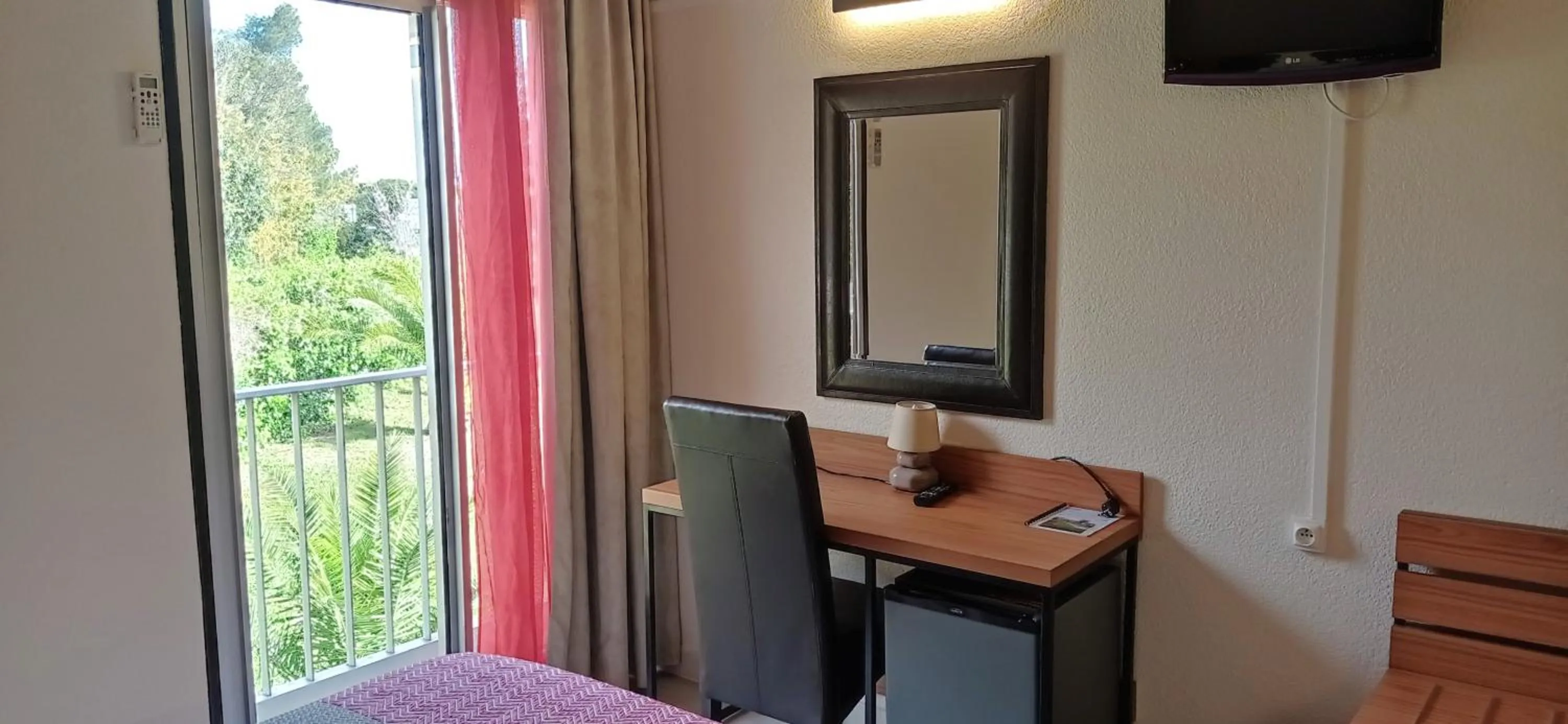 Bedroom in Brit Hotel Confort Hélios Agde