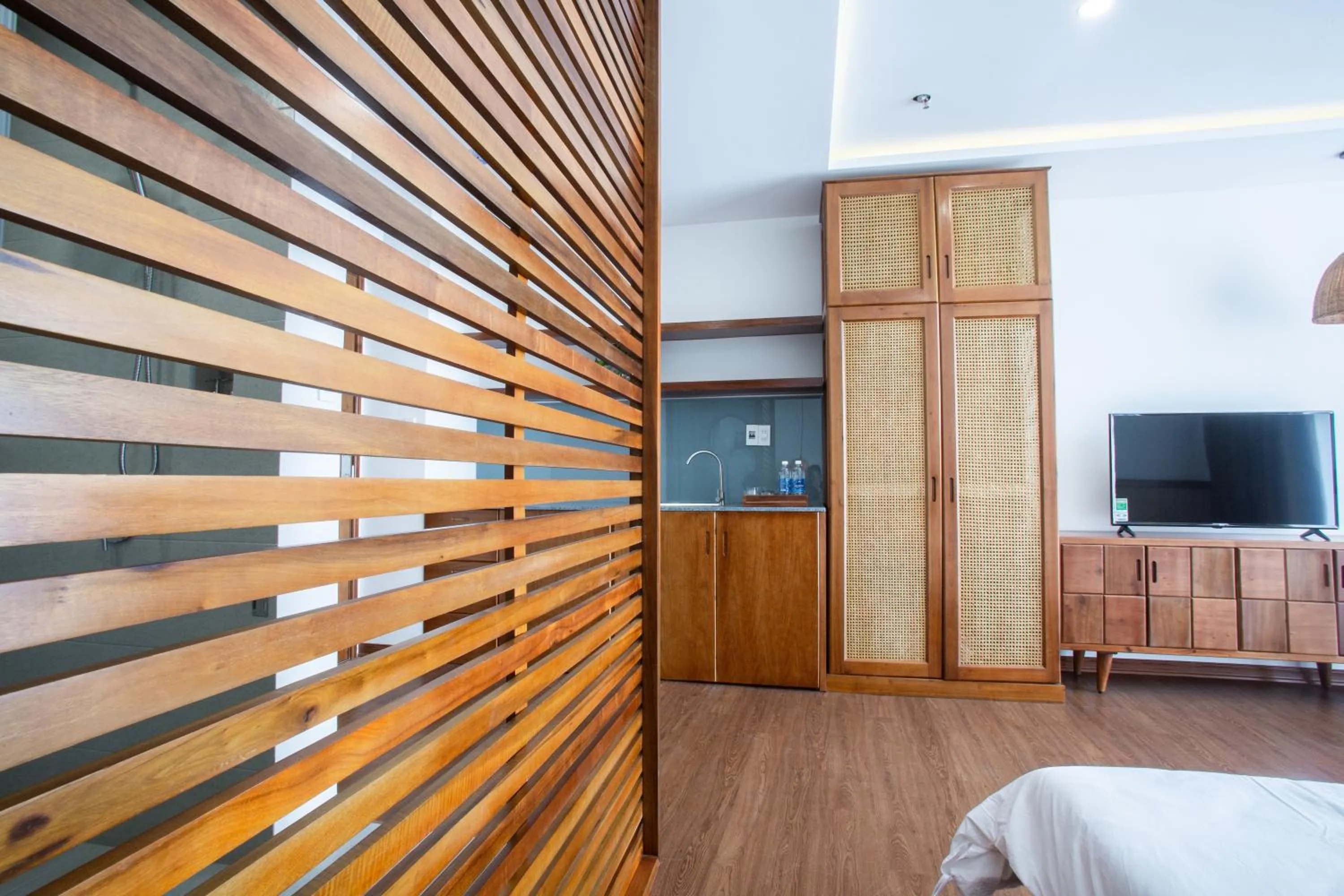 Communal lounge/ TV room, Bed in Luu Ngai Condotel Quy Nhon