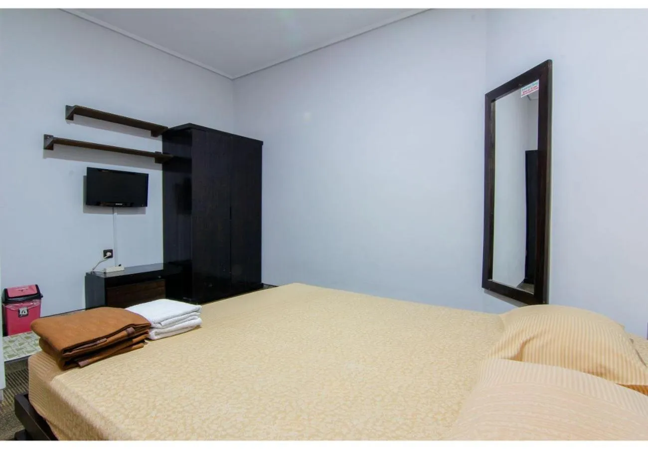 Photo of the whole room, Bed in Embe Enem Homestay