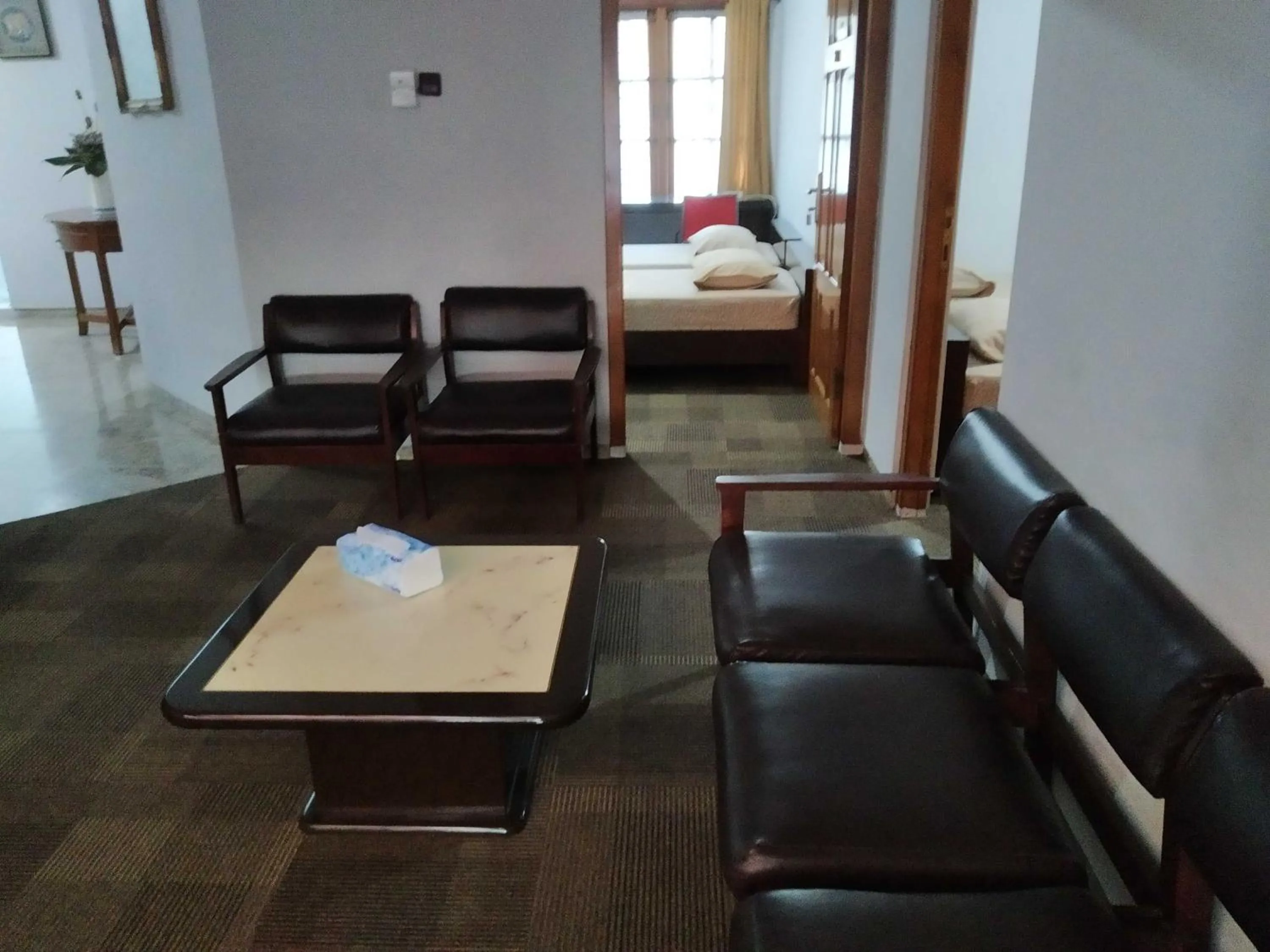 Seating area, Bed in Embe Enem Homestay