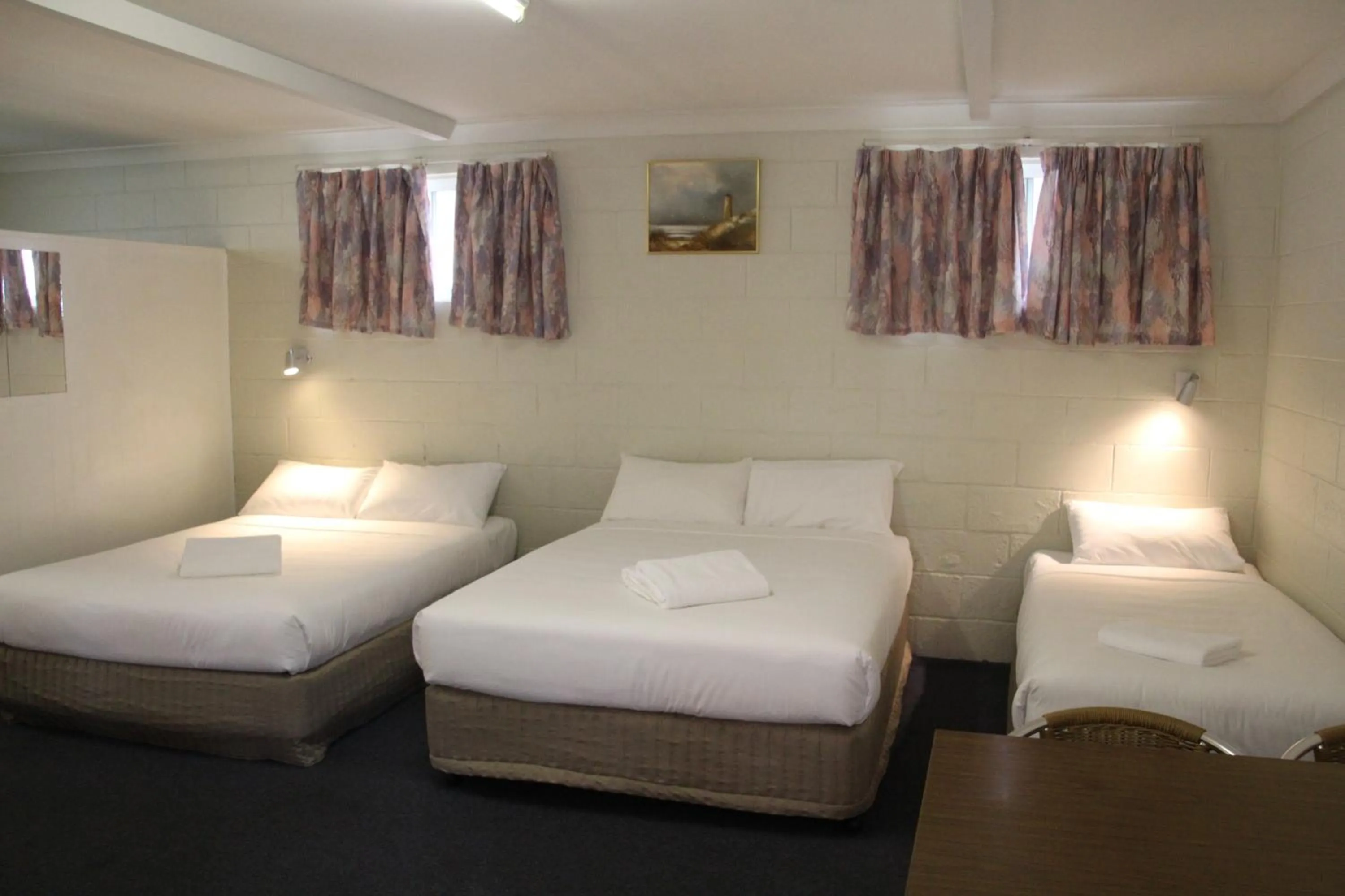 Bed in Central Coast Motel