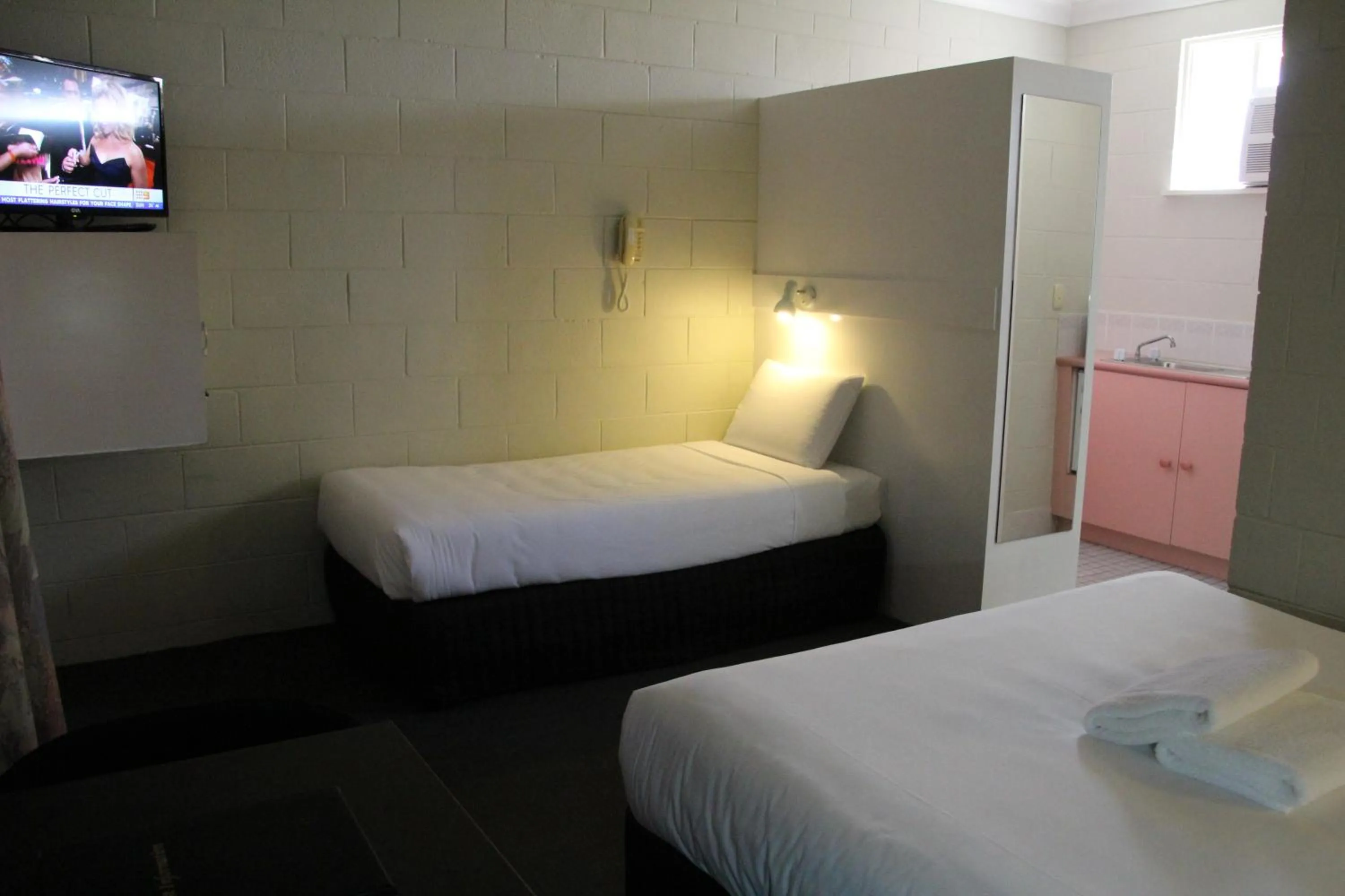 Bed in Central Coast Motel