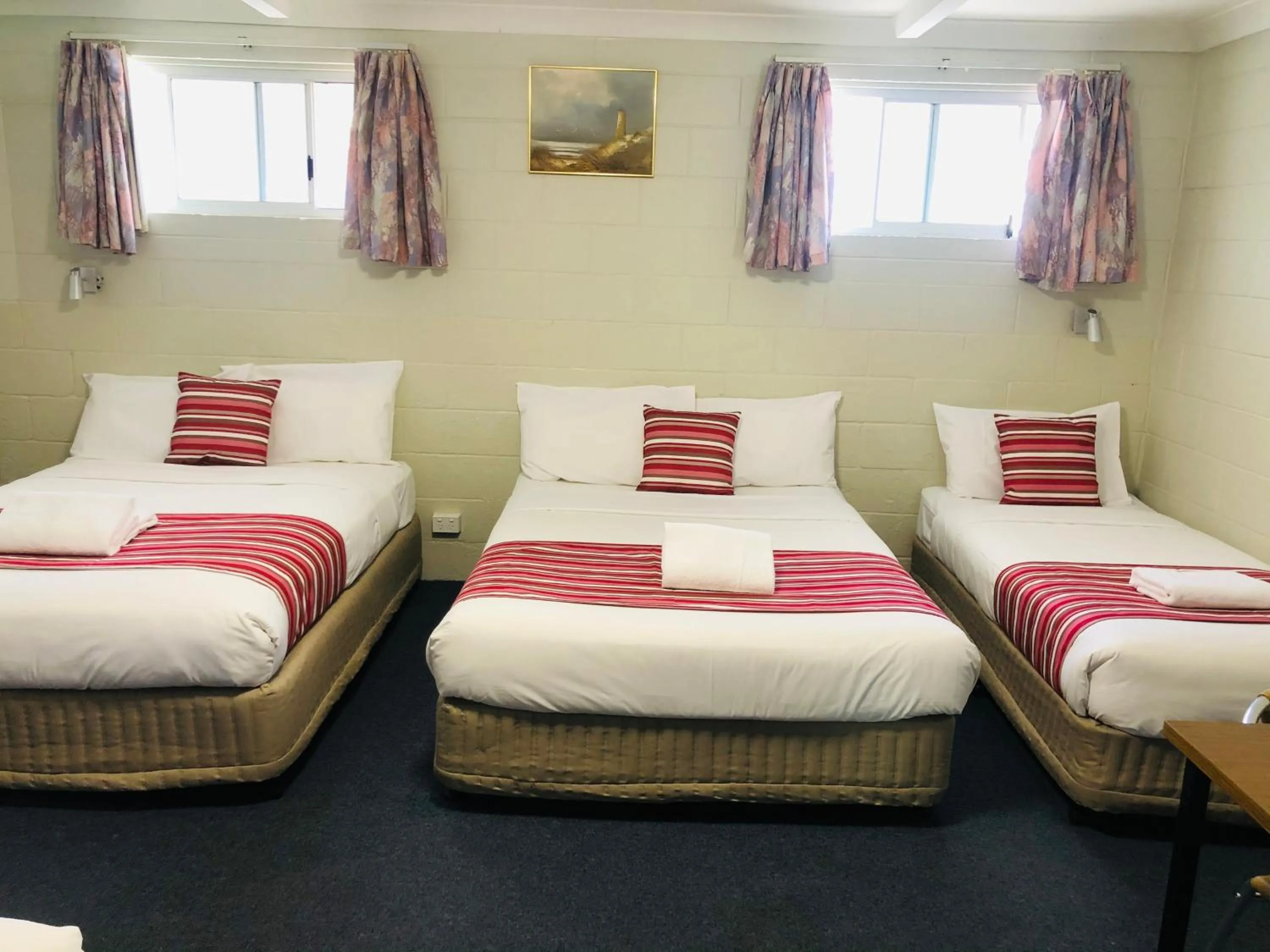 Bed in Central Coast Motel