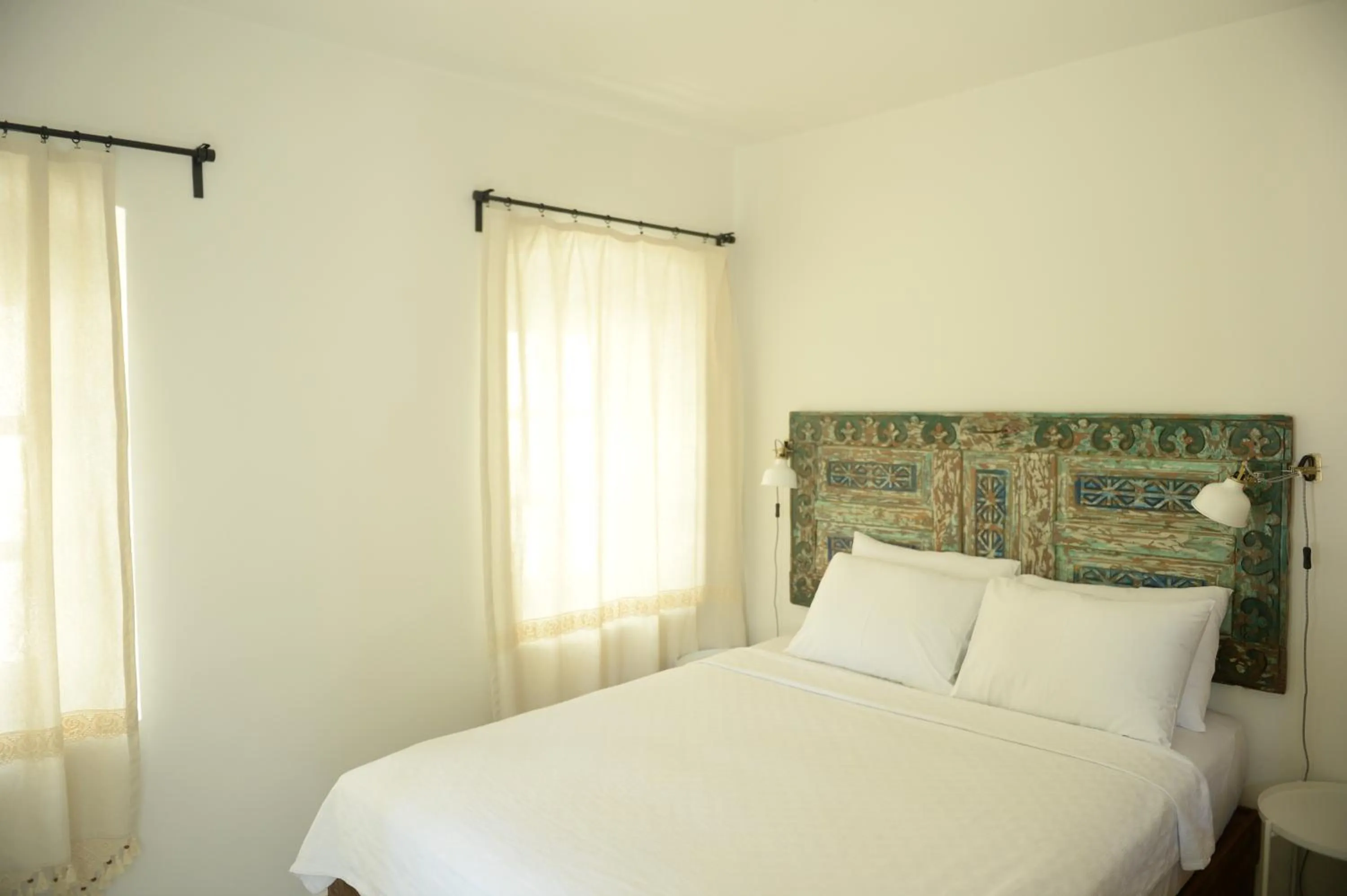 Bed in Oalis Boutique Hotel