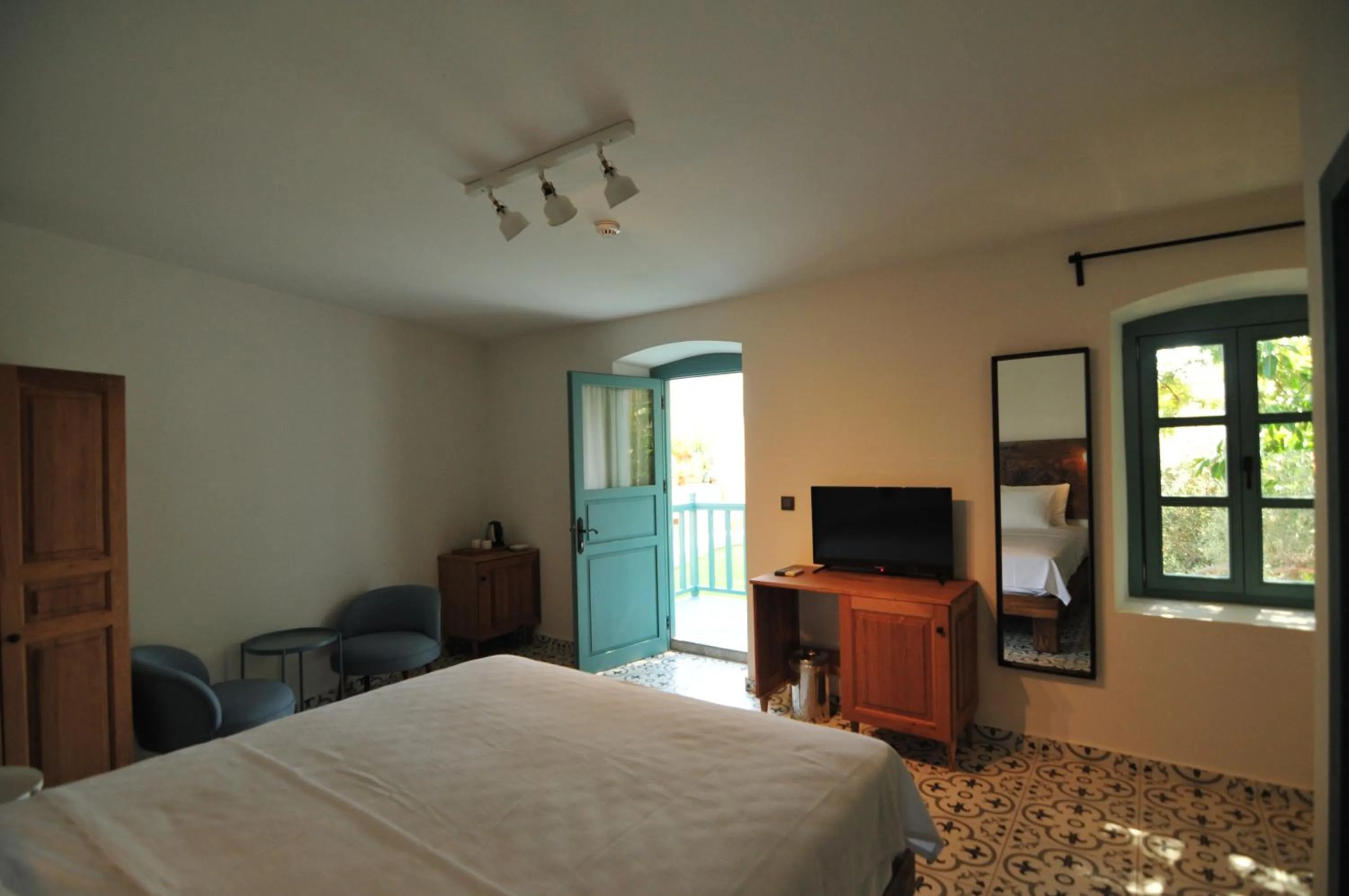 Bed in Oalis Boutique Hotel