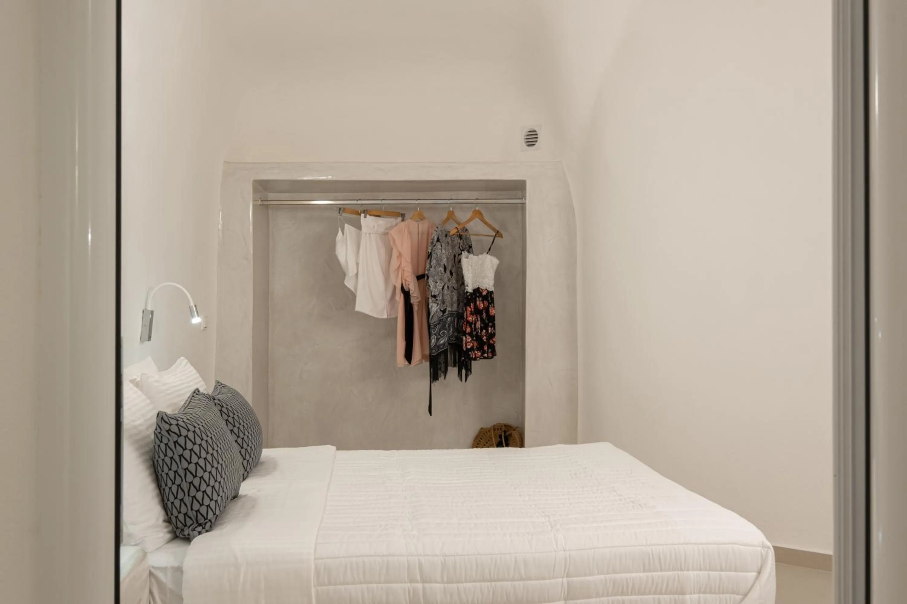 Bed in Santoterra Antigua Suites