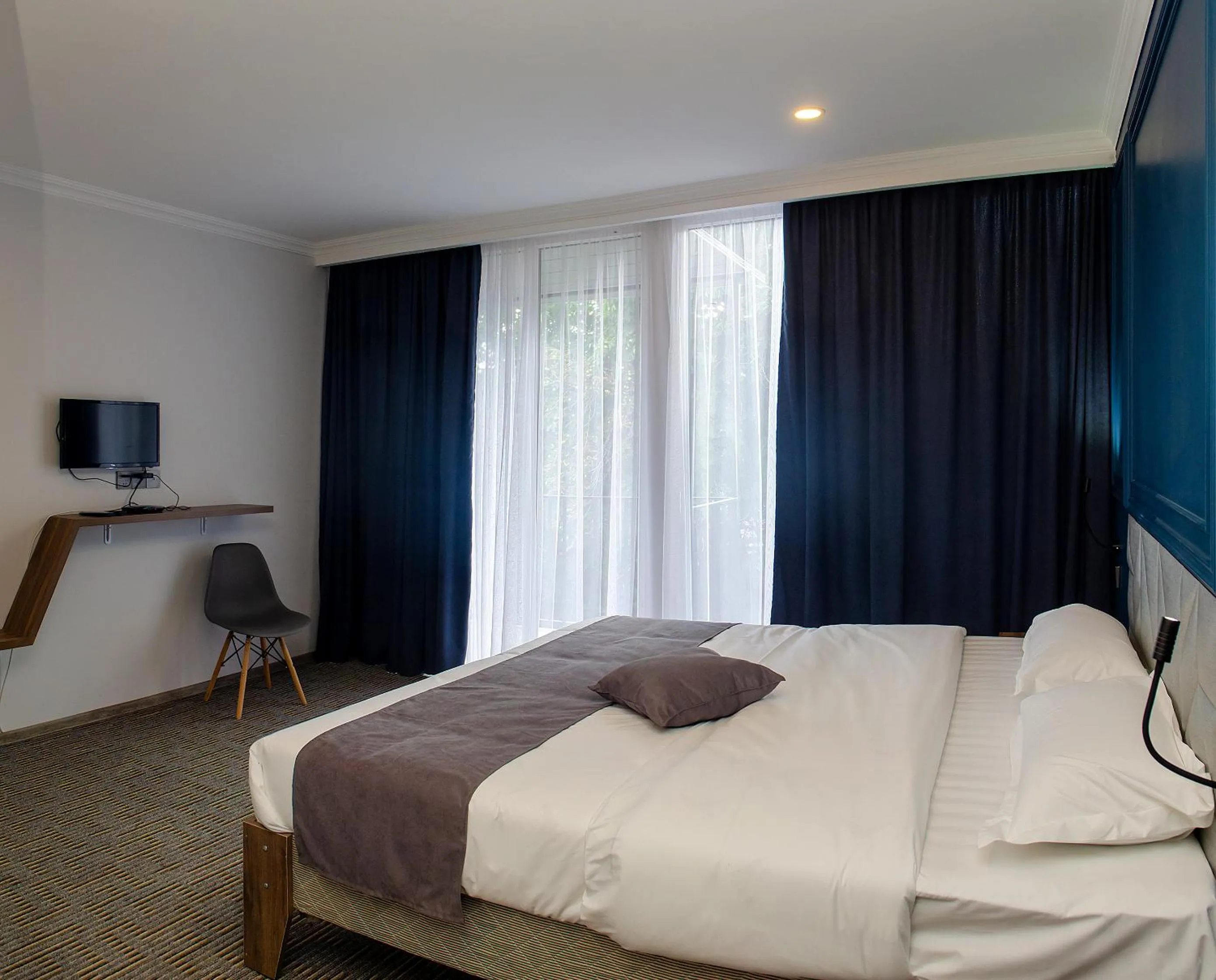 Bedroom in The Residence Hotel & Cottages