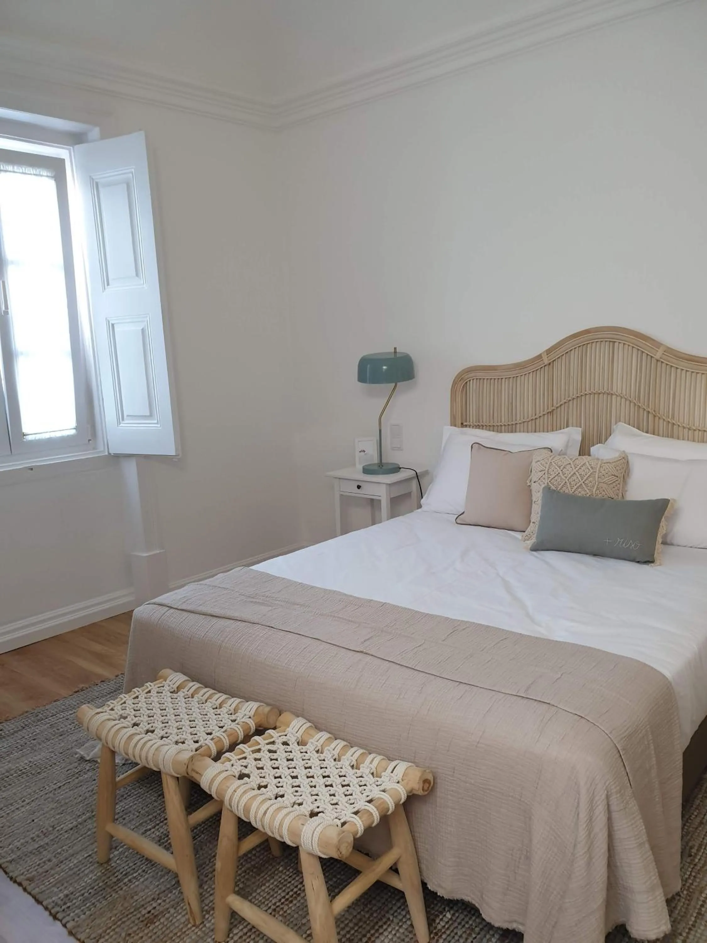 Bed in Lavradores Boutique Guesthouse